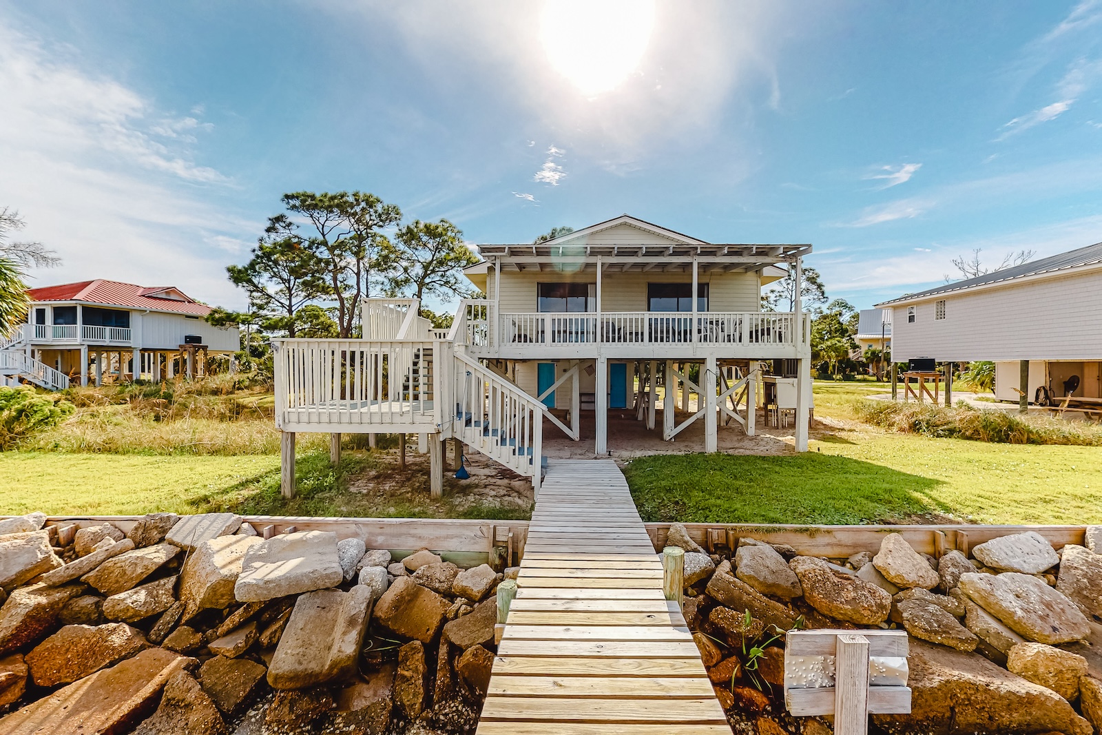 The exterior of a vacation rental on St. George Island as seen from the dock.