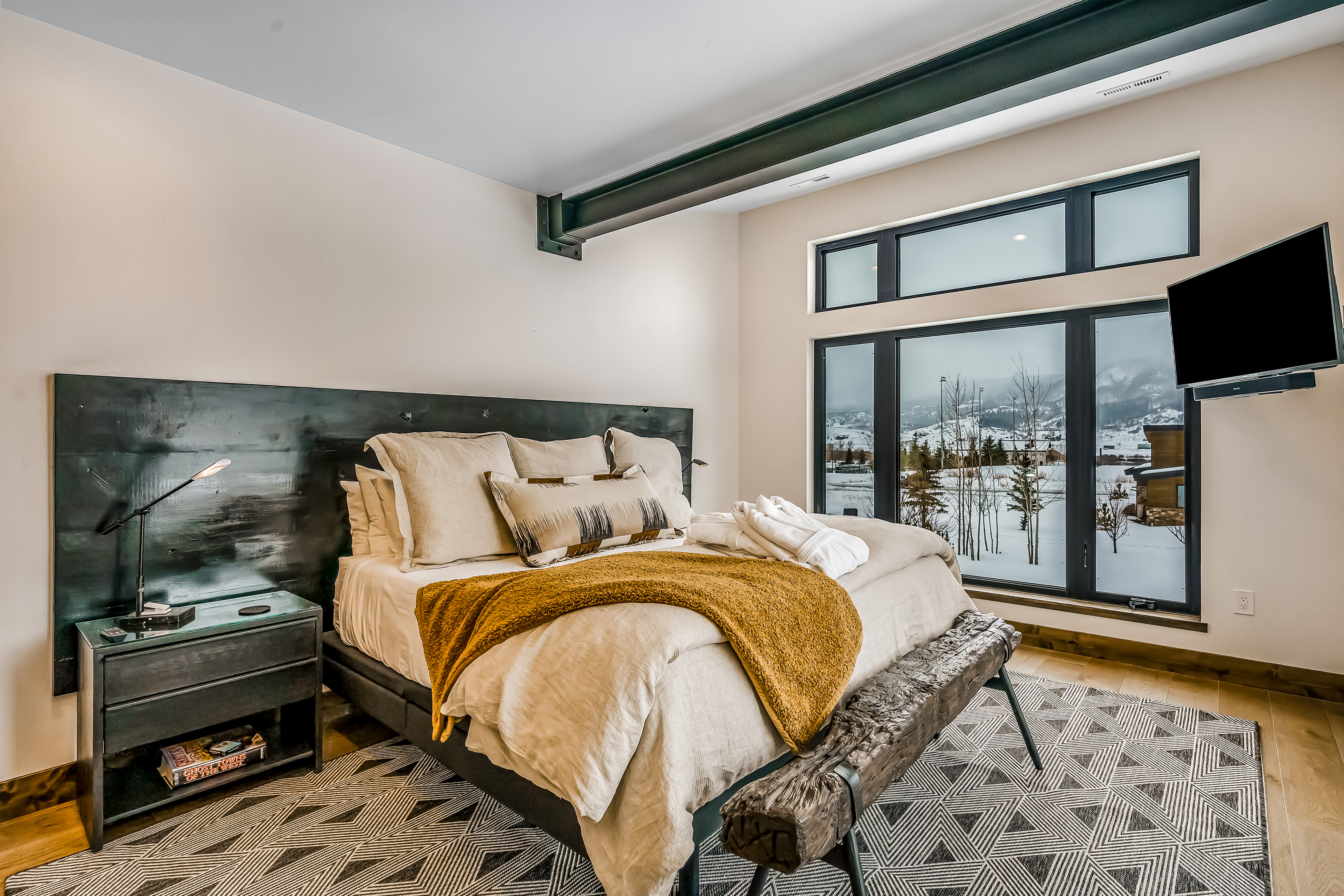 bedroom of steamboat springs, colorado vacation home with modern yet cozy decor