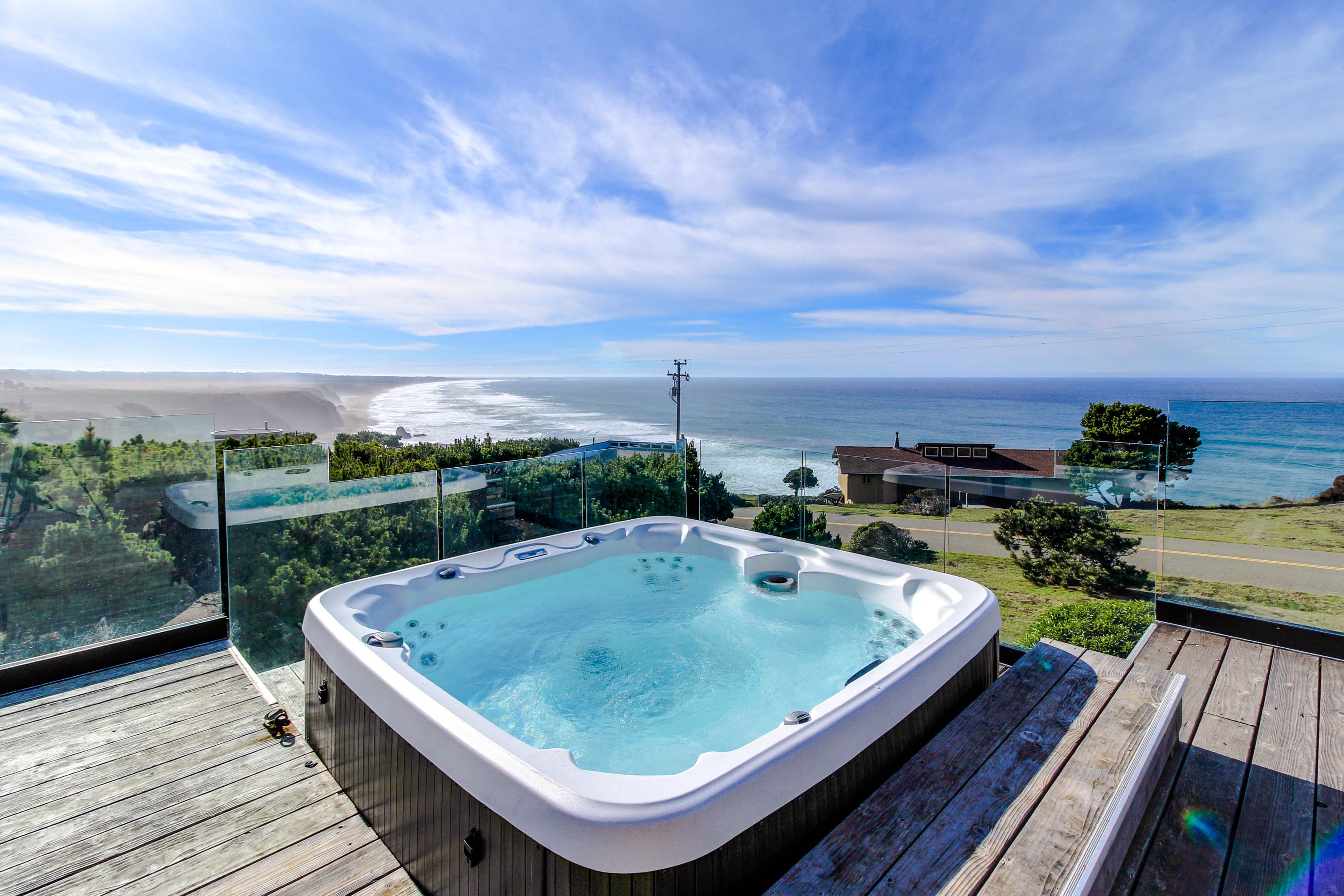 private hot tub sits on deck with ocean views in Manchester, CA