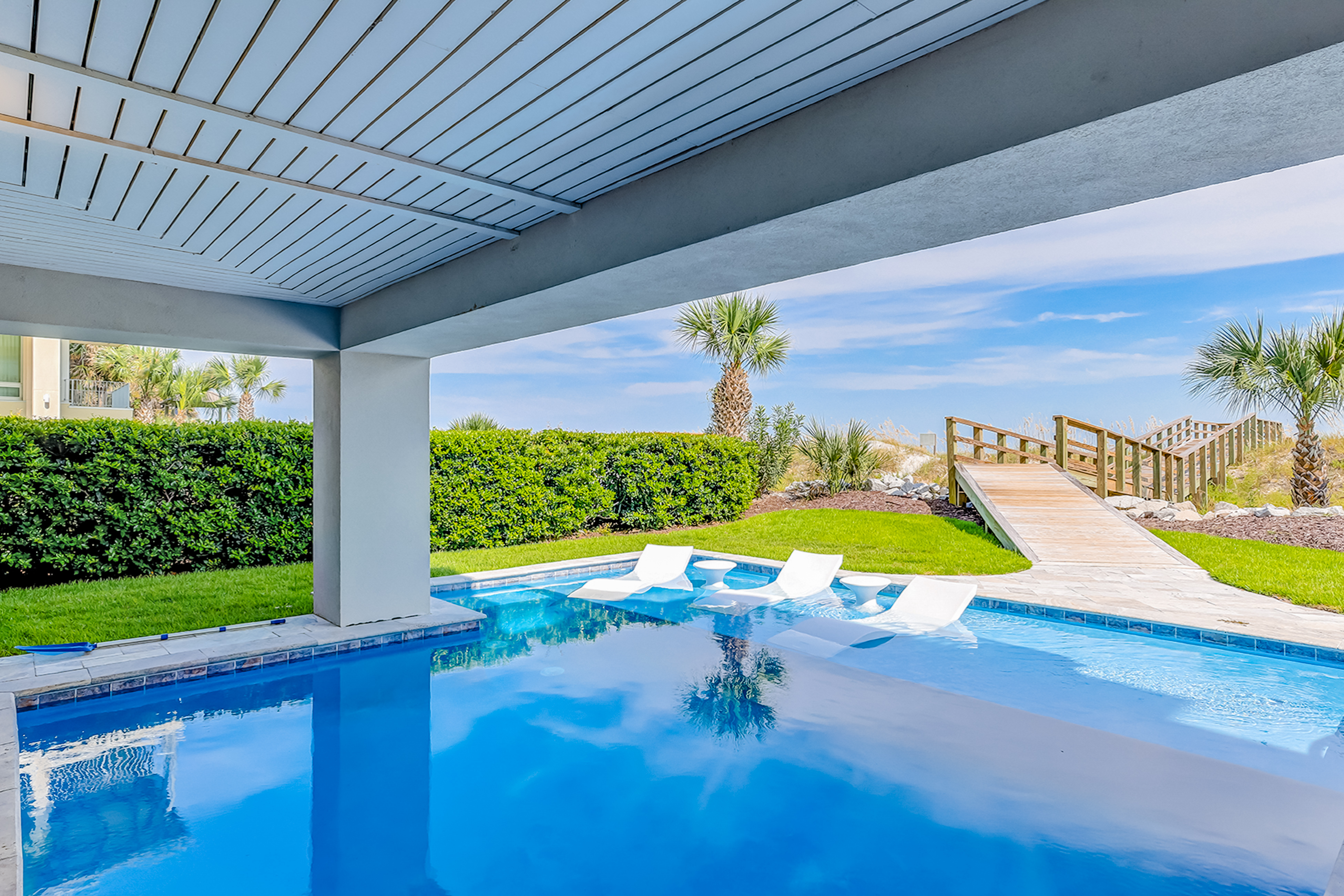 View from the pool towards a beach at a rental in Hilton Head Island
