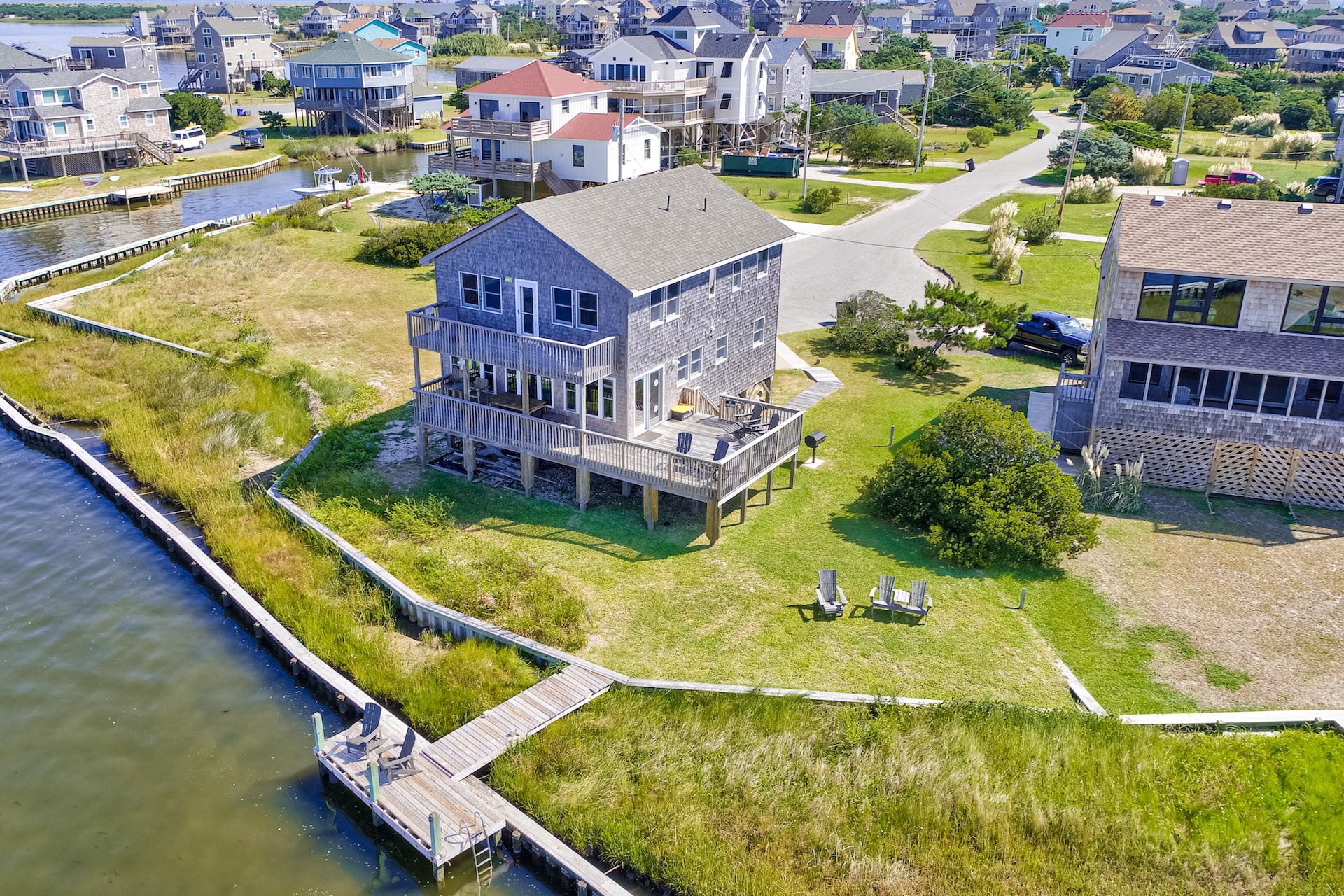 Drone shot of a large house near the water on Hatteras Island.