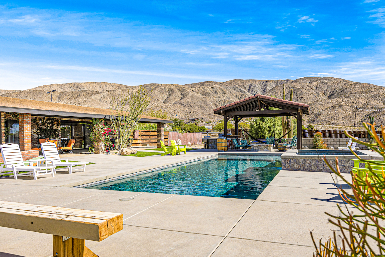 The pool area of a rental in Coachella valley.