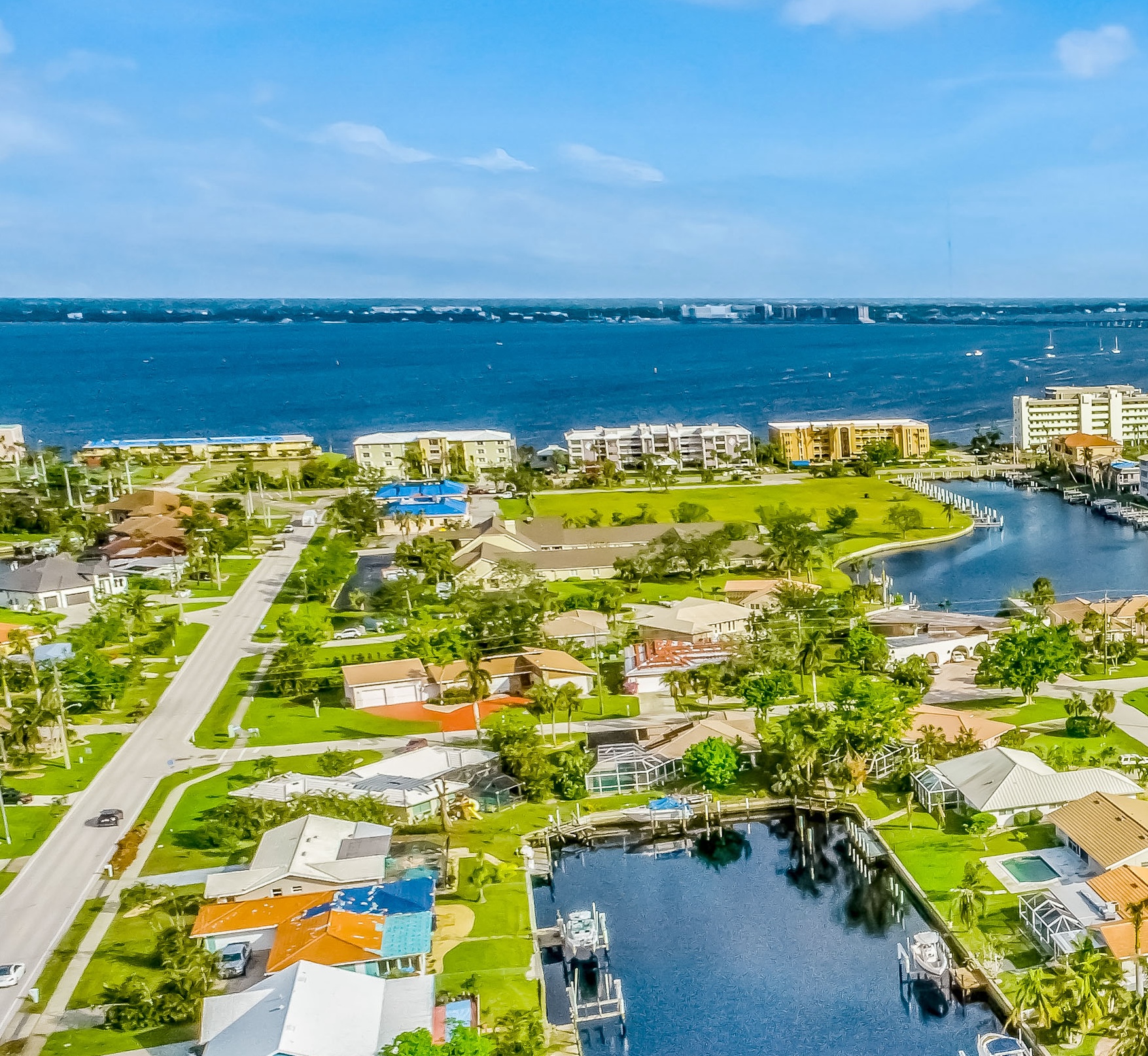 Drone shot of Punta Gorda overlooking homes and the water.