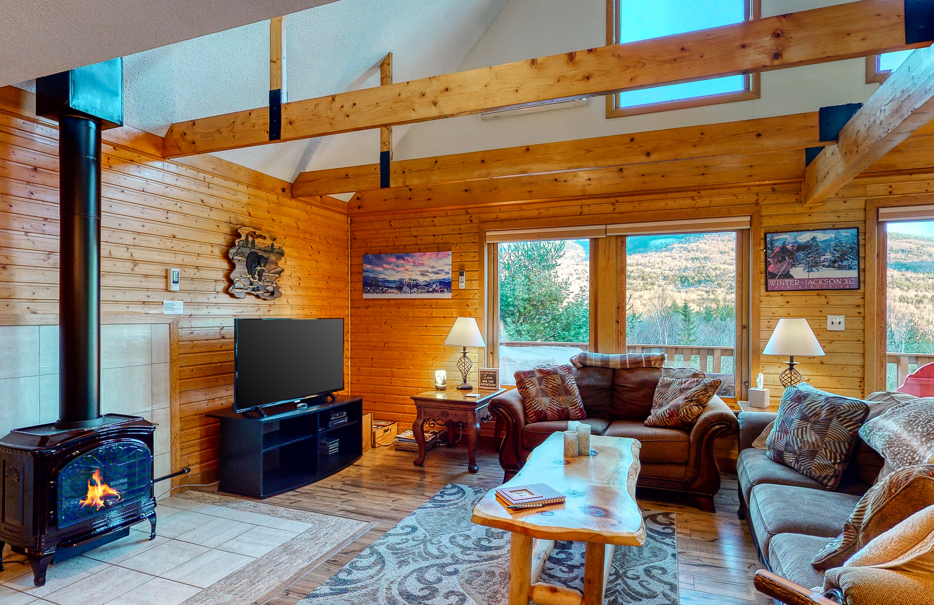 Wood burning stove in a log style cabin in Bartlett, NH