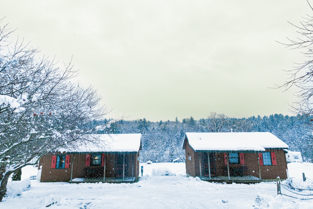 Cabins covered in snow.