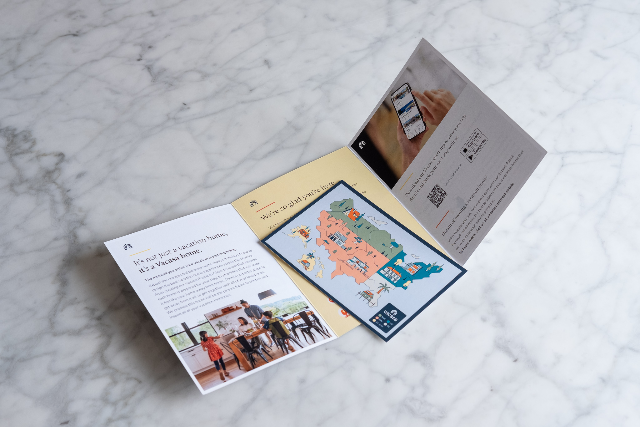 Vacasa welcome brochure with postcard