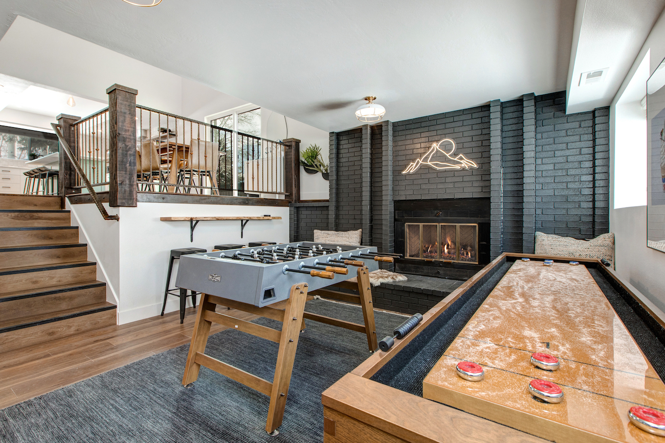 The interior of a vacation rental condo in Park City with a game room.