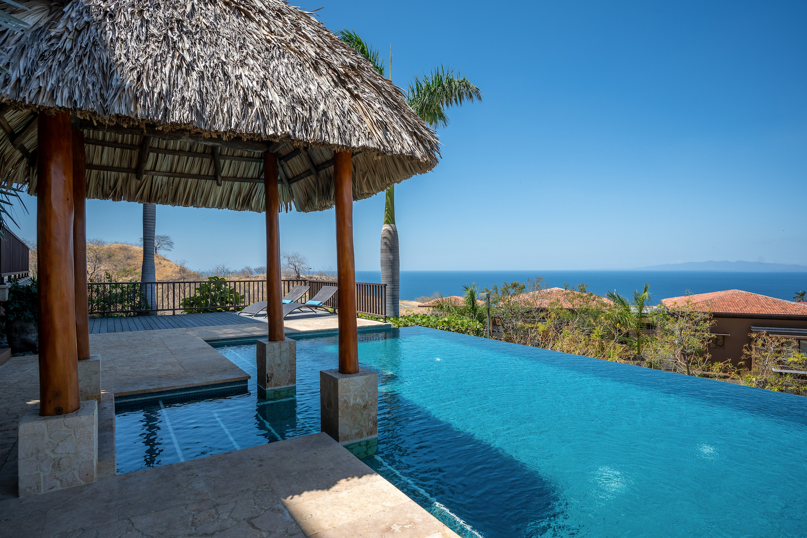 An infinity pool with a covering at a vacation rental in Costa Rica.