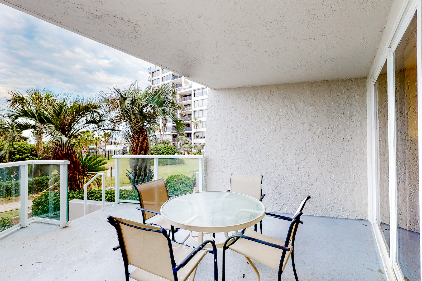 The outdoor patio space at a vacation rental in Miramar Beach, Florida.