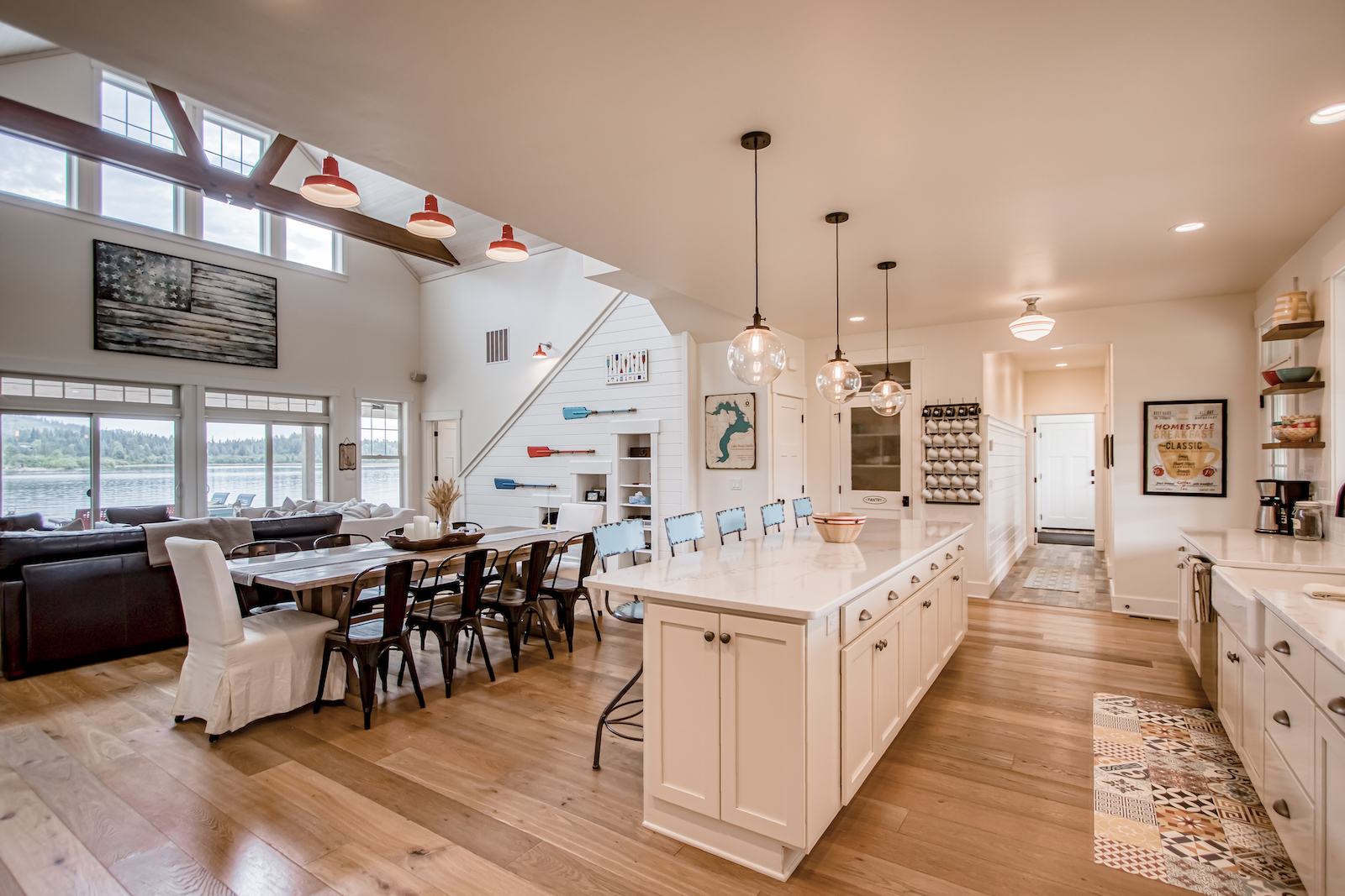 The dining area and kitchen of an elegant lakefront vacation rental in Laclede, Idaho.