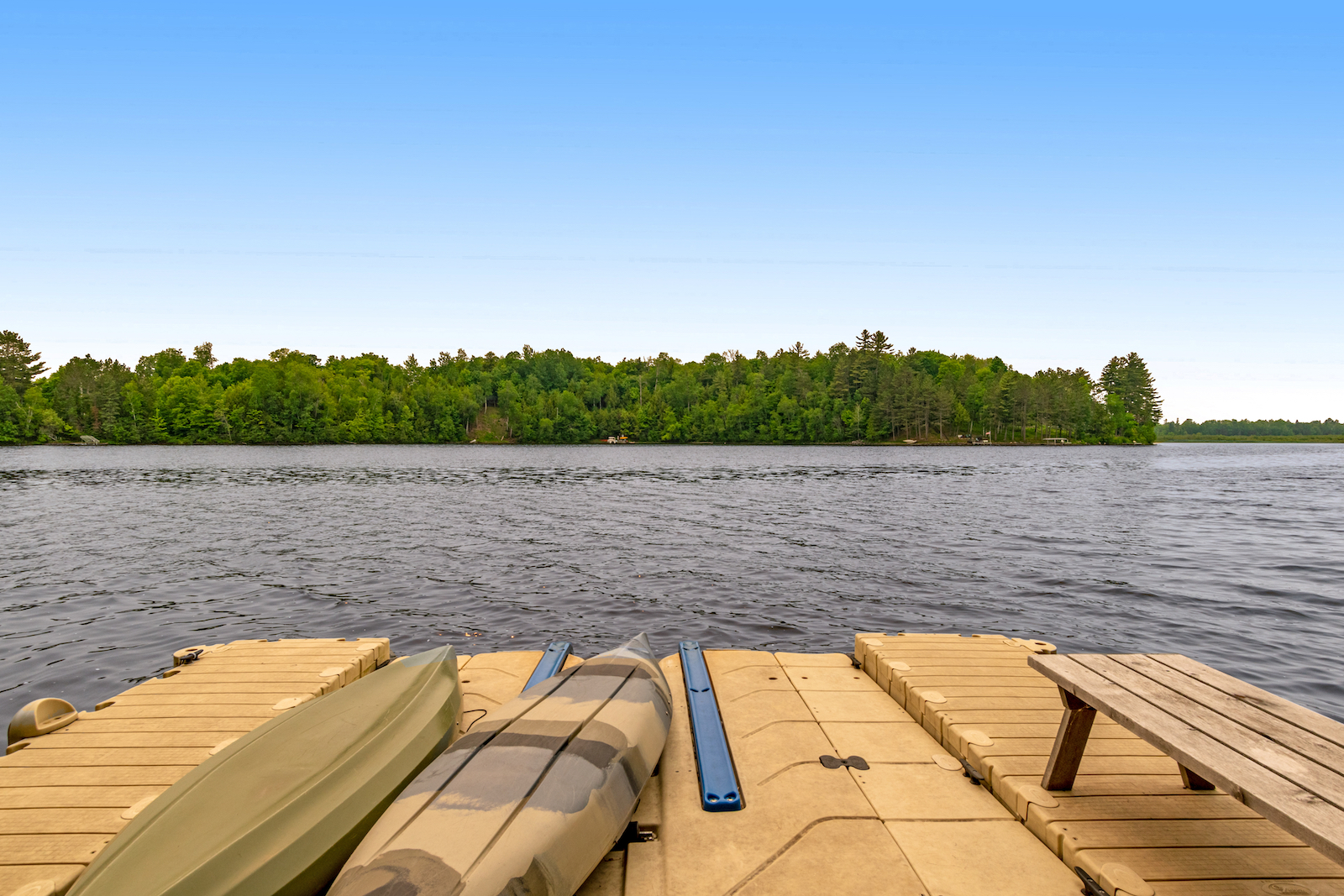 Two boats on a dock on Mercer Lake in Wisconsin.