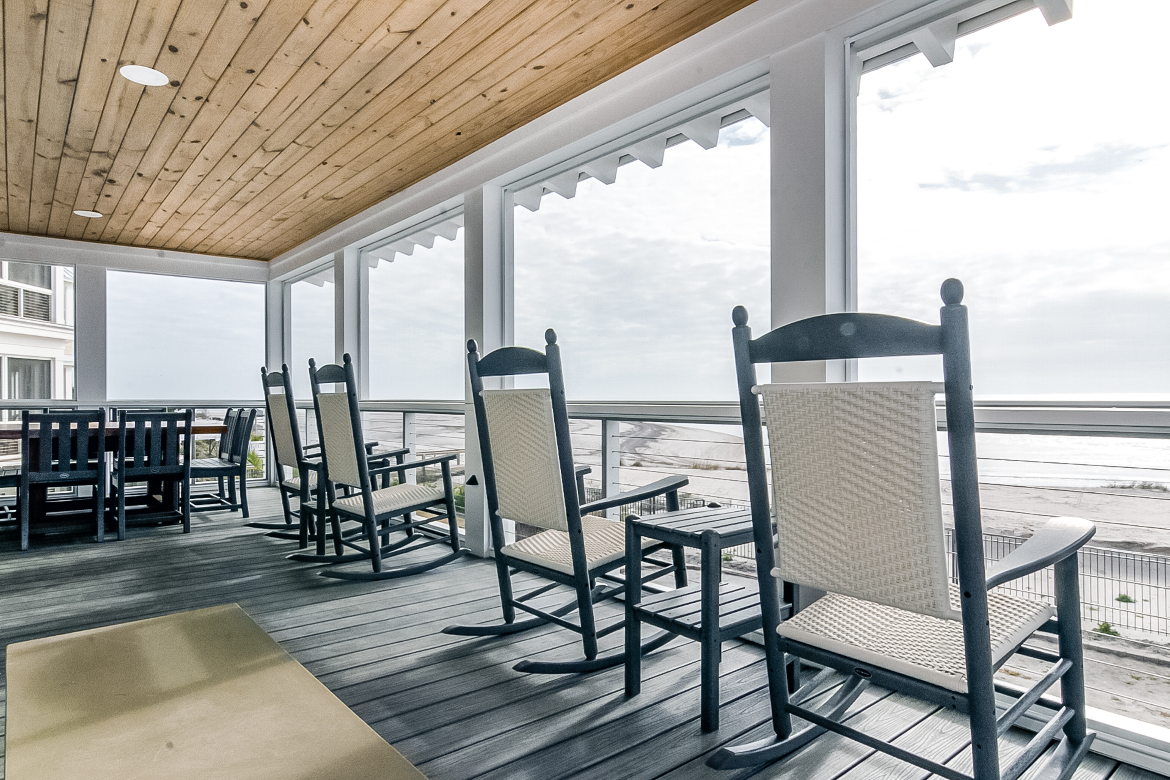 Porch room of a vacation rental with an oceanfront view in Edisto Beach, SC