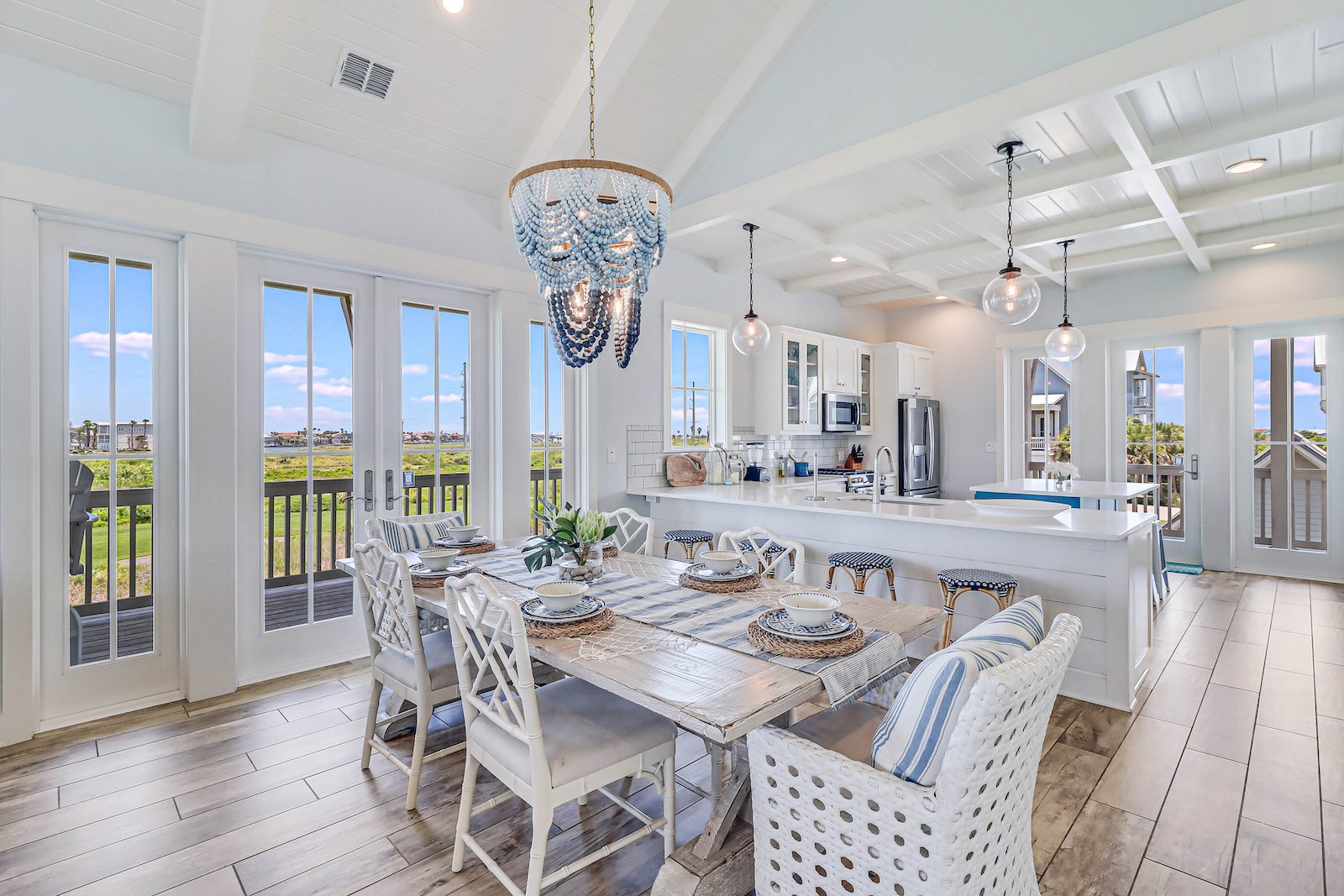 The kitchen and dining room with elegant design at a Port Aransas, TX vacation rental.