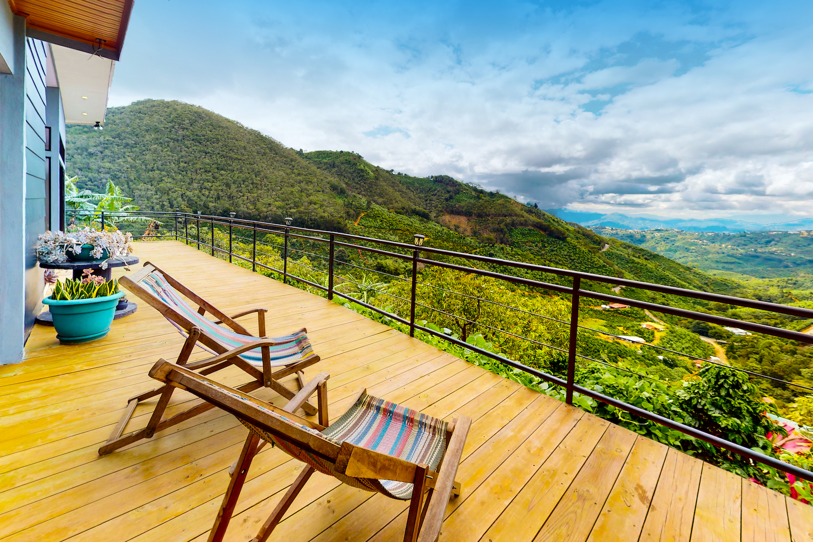 The balcony at a vacation rental in San Jose, Costa Rica with a view.