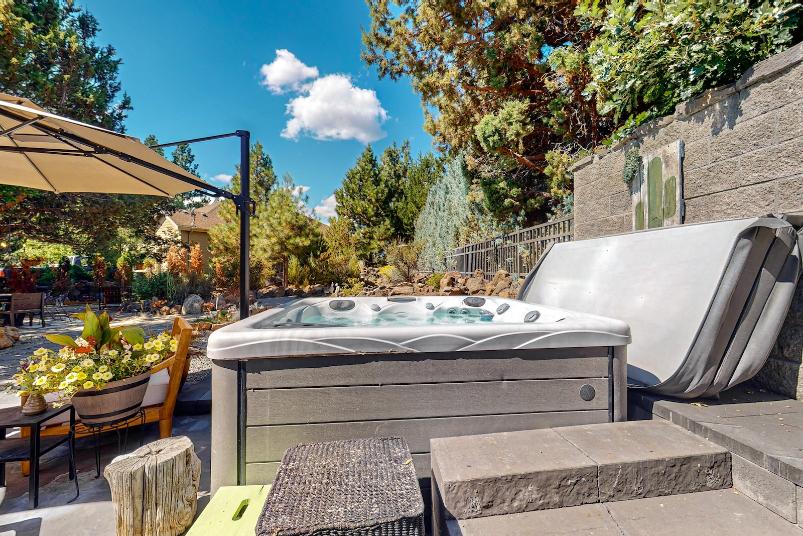 The hot tub area at a Bend, OR vacation rental.
