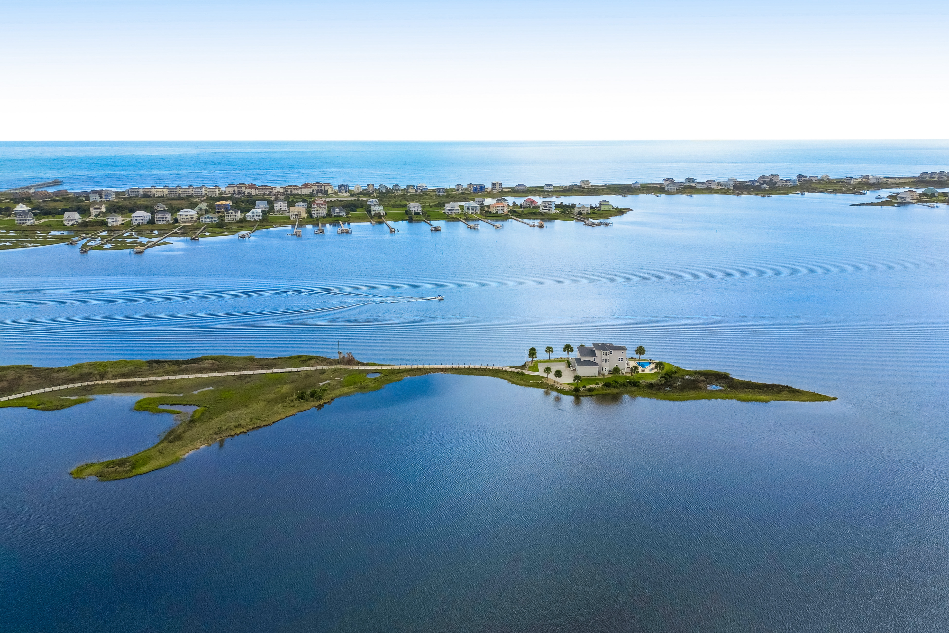 A drone shot of a home on an island in North Carolina.
