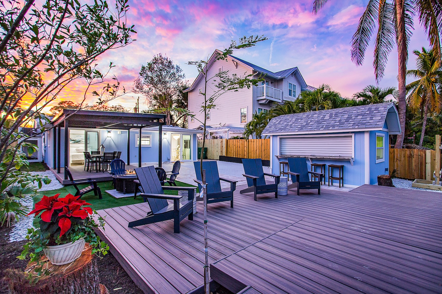 The porch area of a vacation rental in Naples at dusk