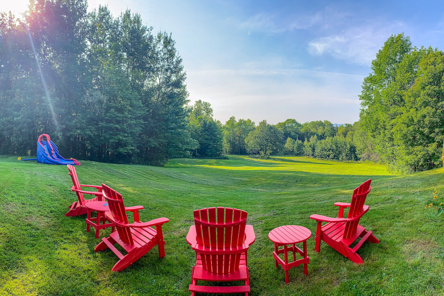 Chairs overlooking a large field in Wilmington, VT.