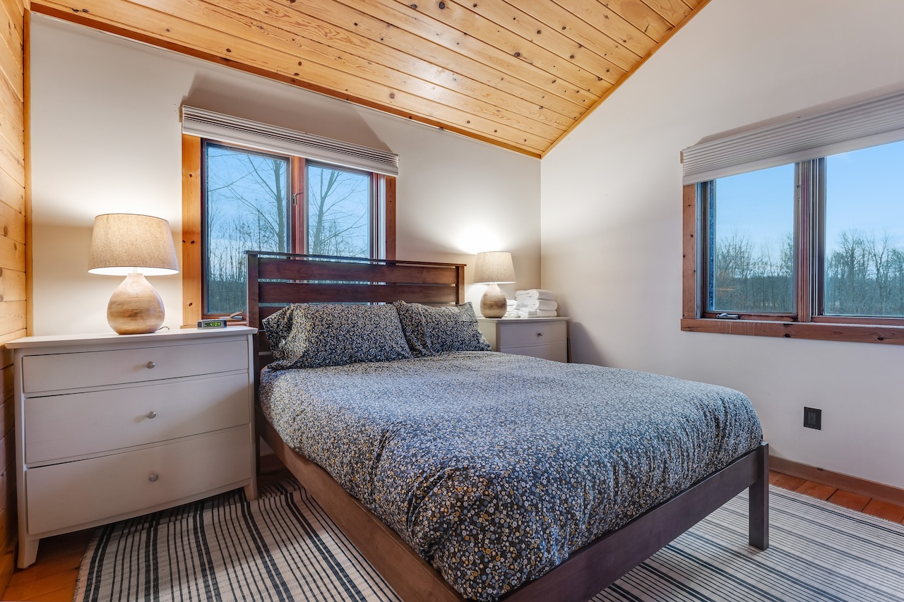 The bedroom of a rental in Isle La Motte, VT.