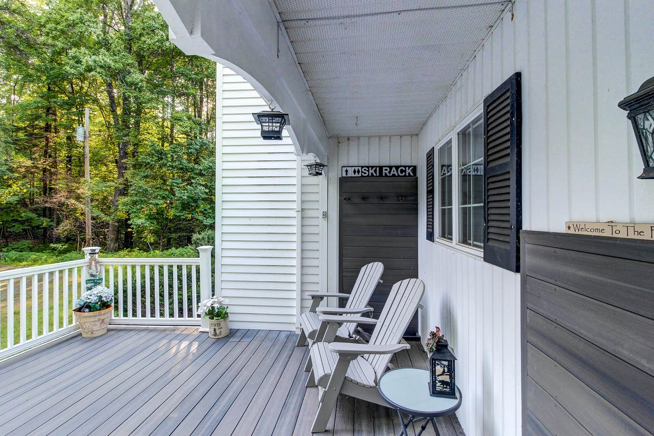 Killington, VT vacation rental with two adirondack chairs on the deck