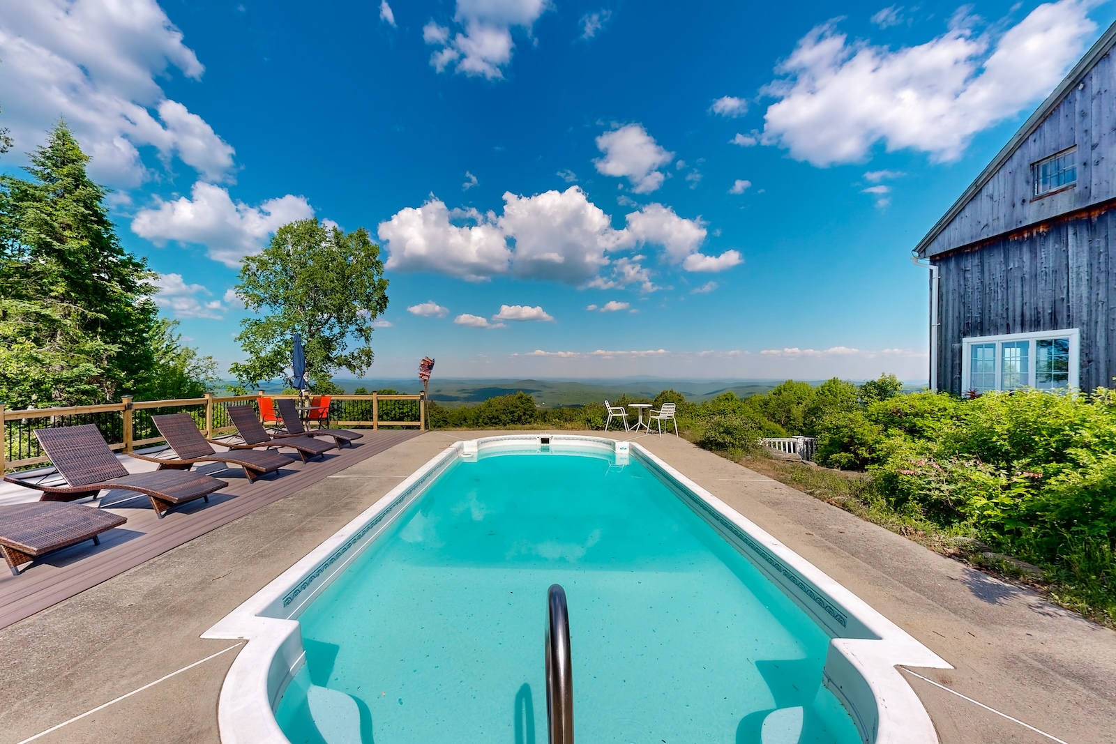 The pool area overlooking the valley in Dover.