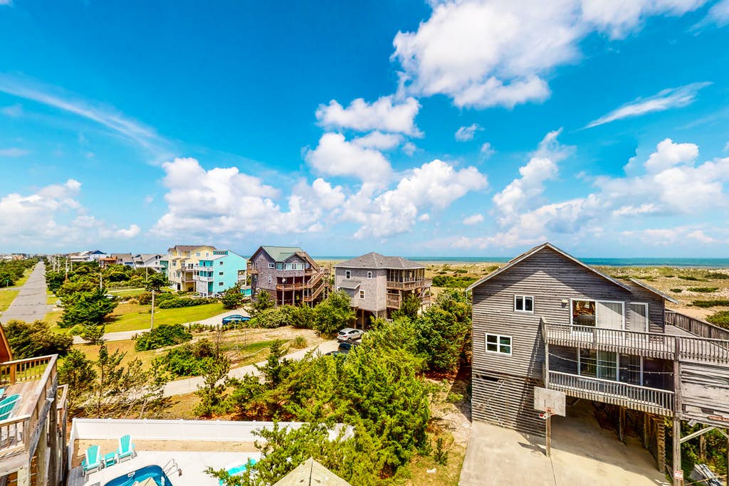 Rows of vacation rentals with oceanfront views in Outer Banks, NC.