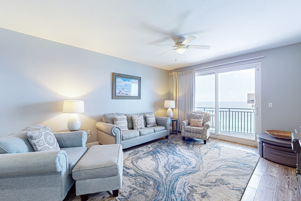 The living area of a condo rental in Sterling Breeze in Panama City Beach, FL.