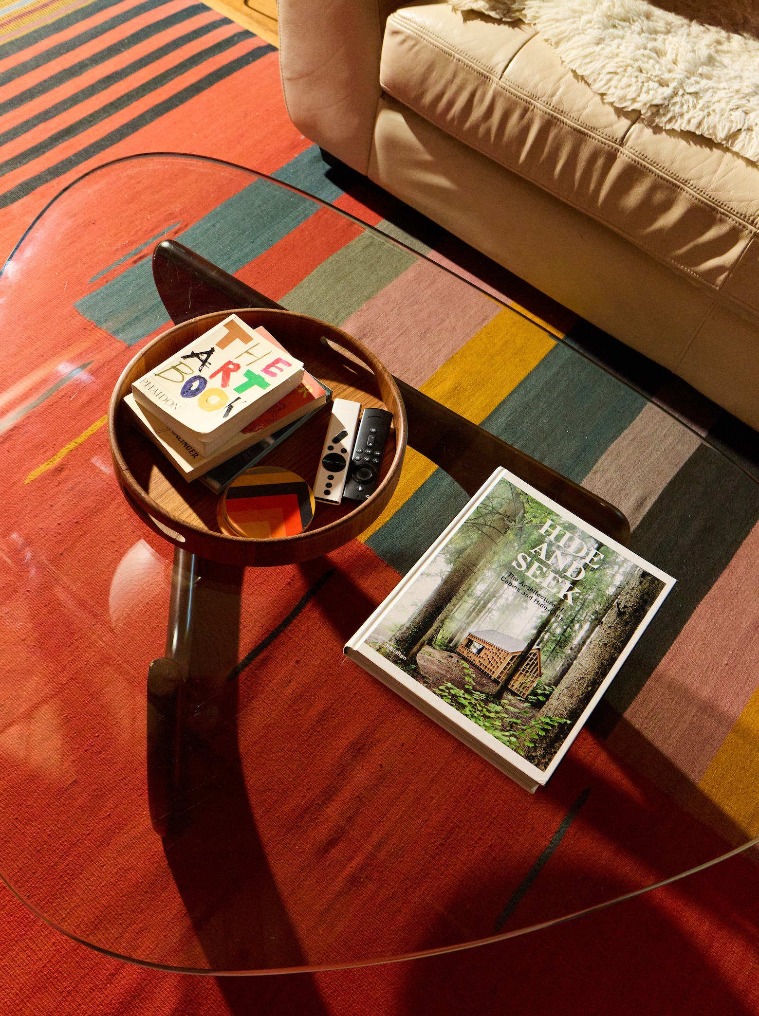 Books and magazines on a coffee table.