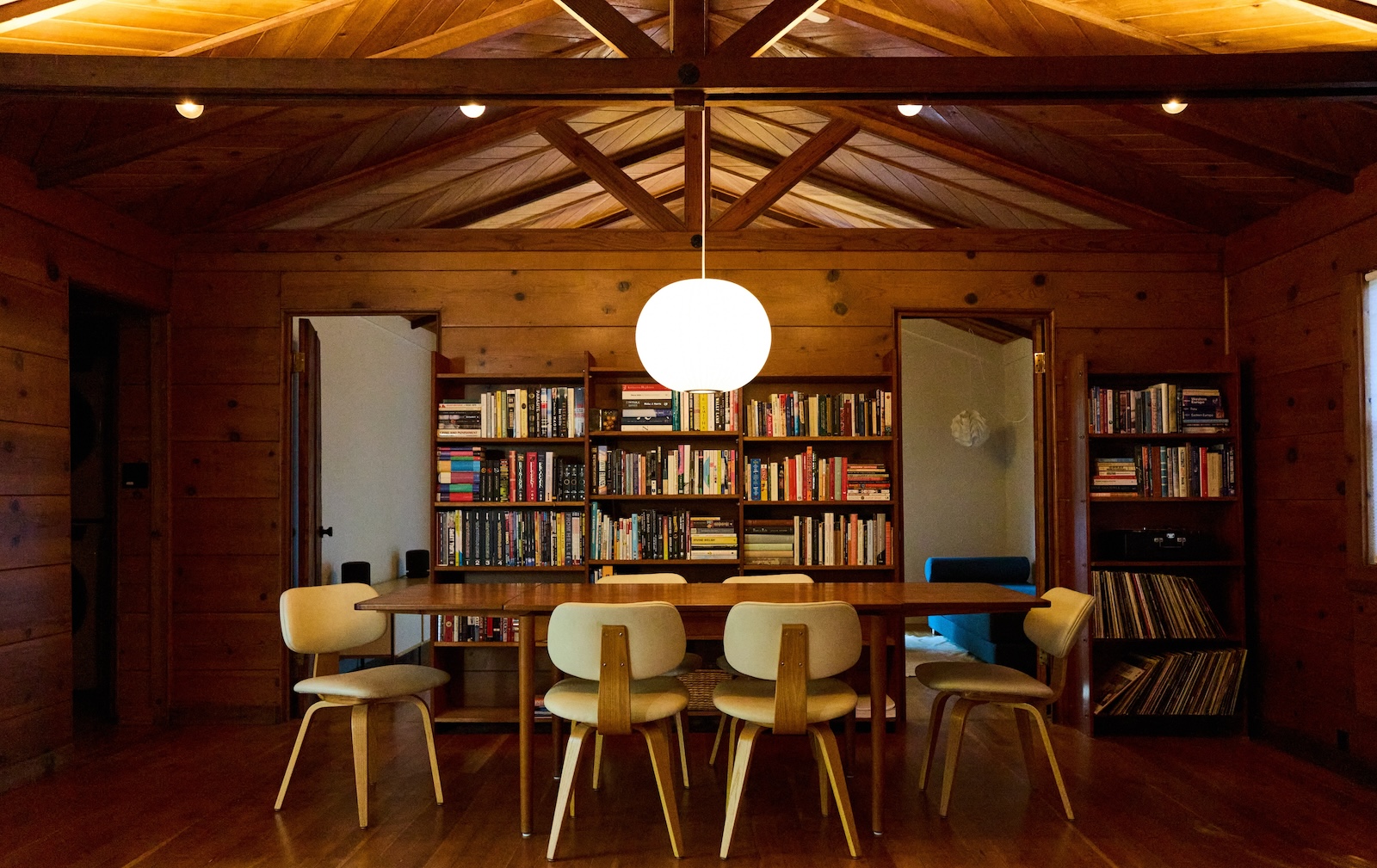 The dining area with bookshelves at a Forestville, CA rental.