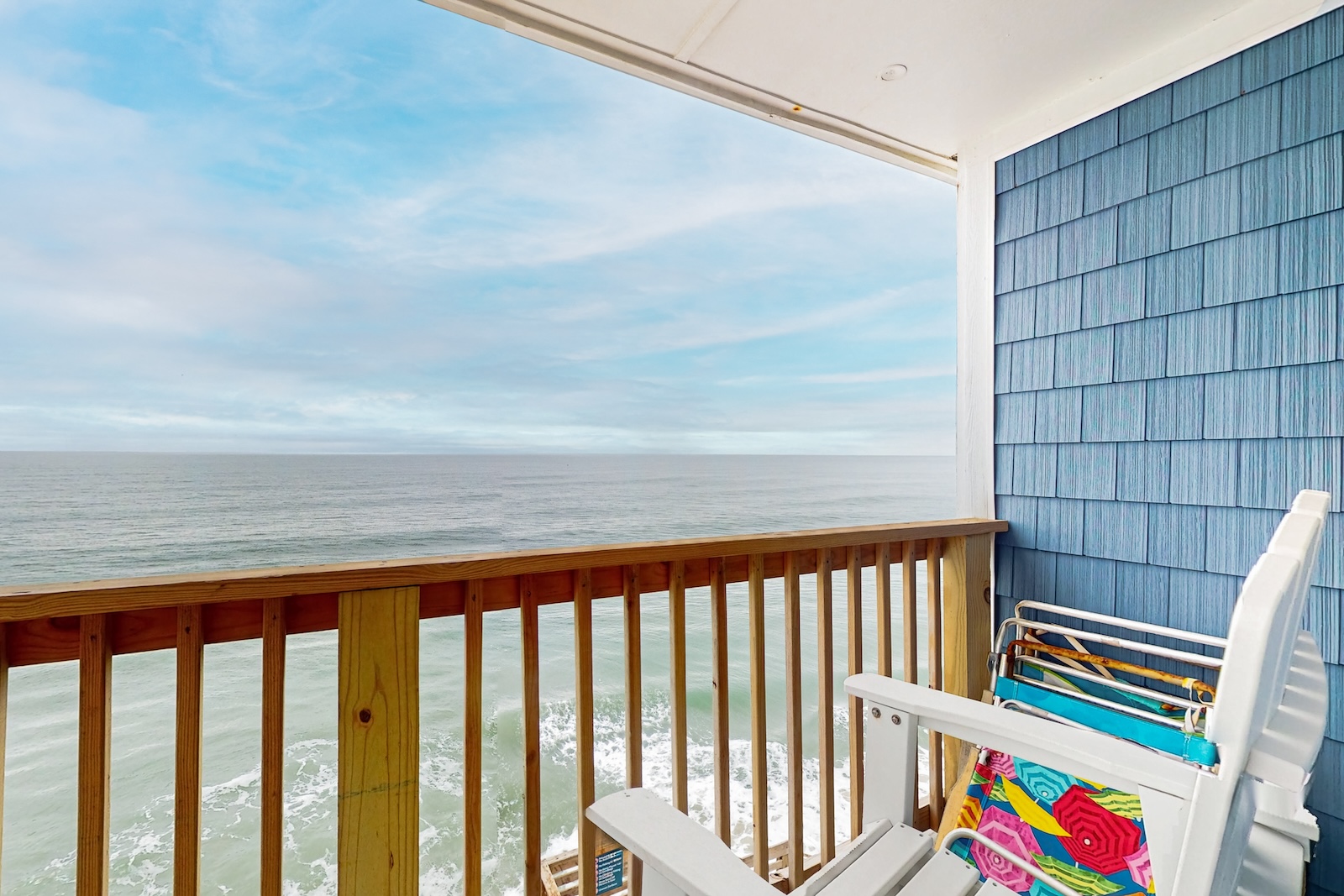 View from the patio at a vacation rental overlooking the ocean.