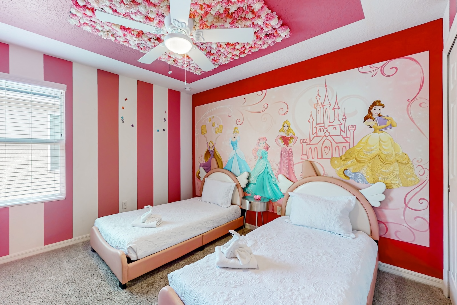 A bedroom with a princess theme.