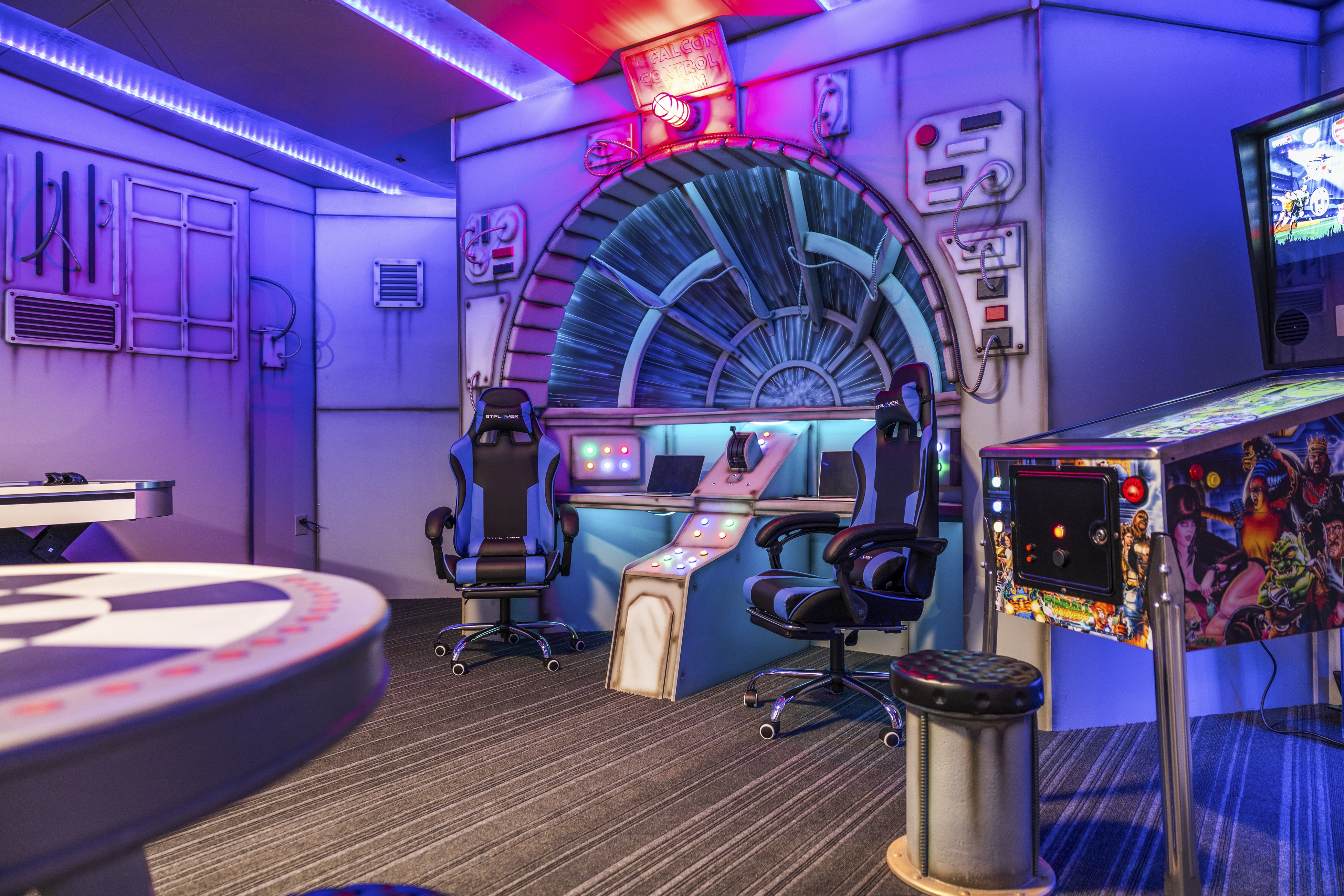 space-themed game room of vacation home in pigeon forge