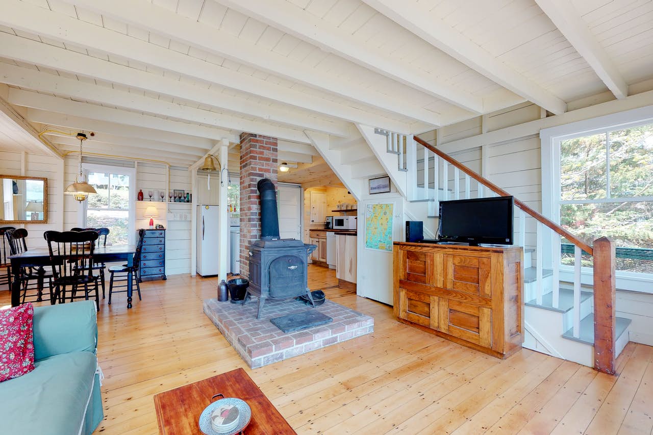 Boothbay Harbor, ME vacation home with wood-burning fireplace and wood paneled ceilings