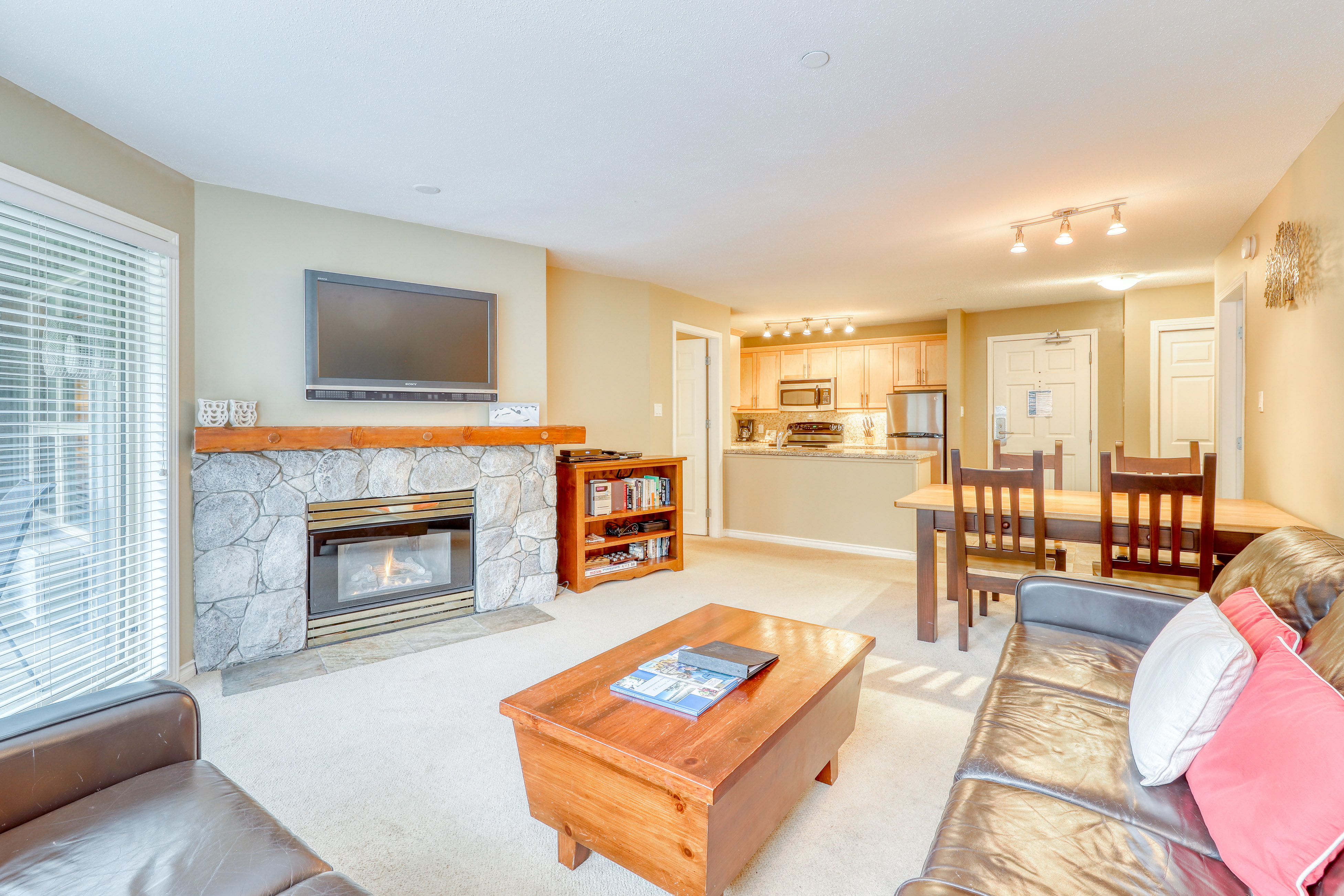 condo rental in aspen, colorado with fireplace and kitchen