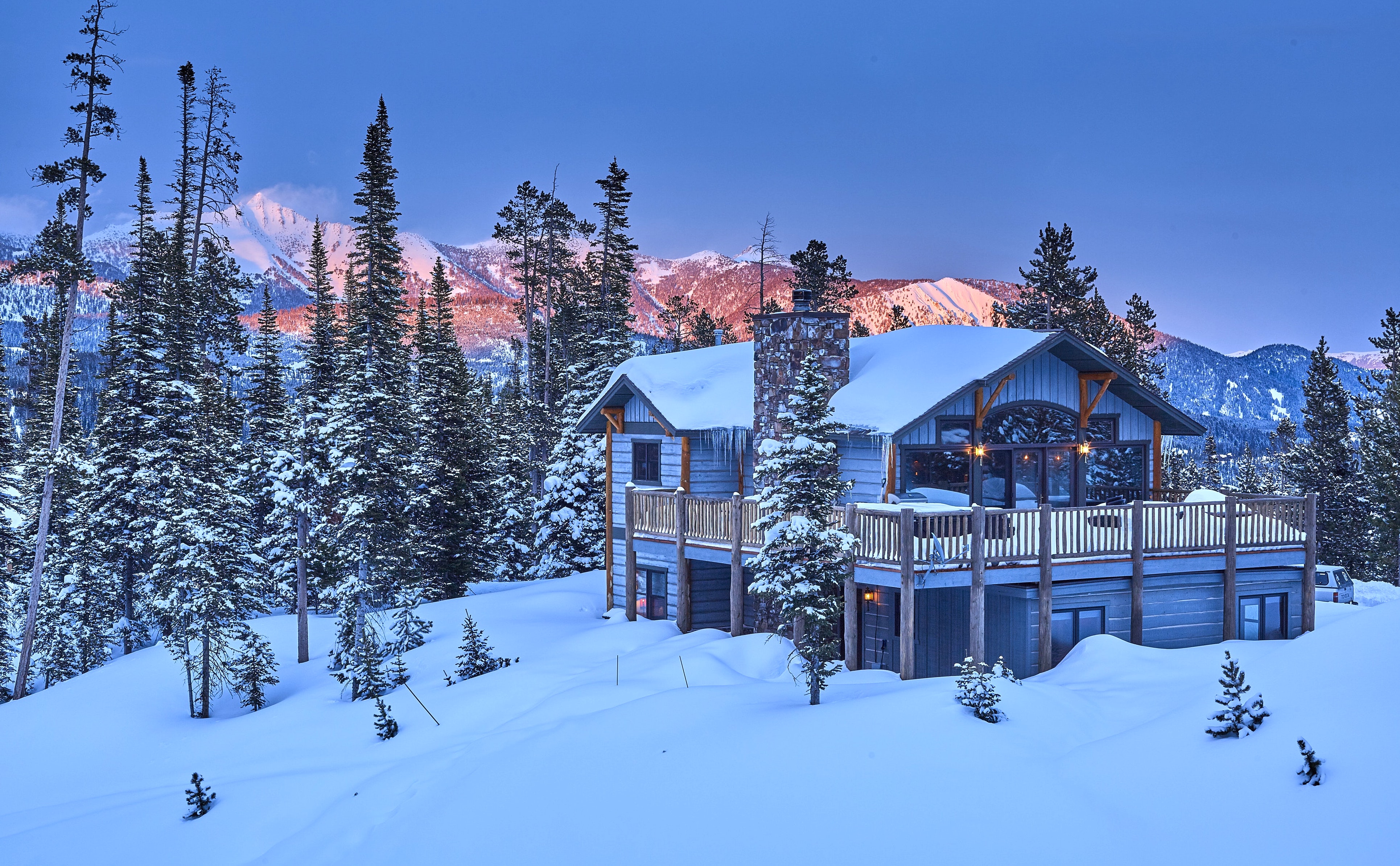 A cabin in Big Sky in the snow.