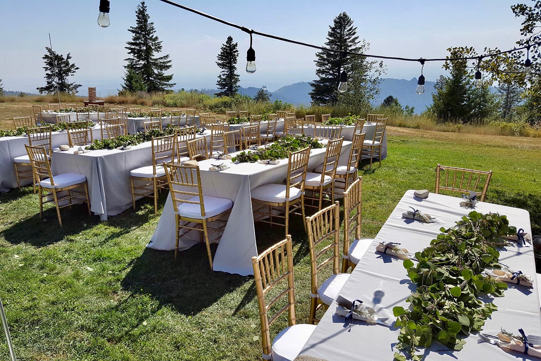 String lights and seating for Bogus Basin wedding dinner