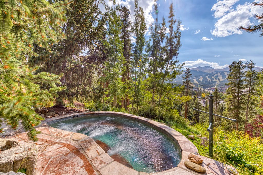 Luxurious outdoor pool overlooking the mountains in Breckenridge, CO