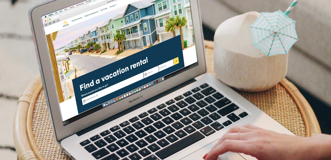 women booking a vacation rental with Vacasa on her laptop
