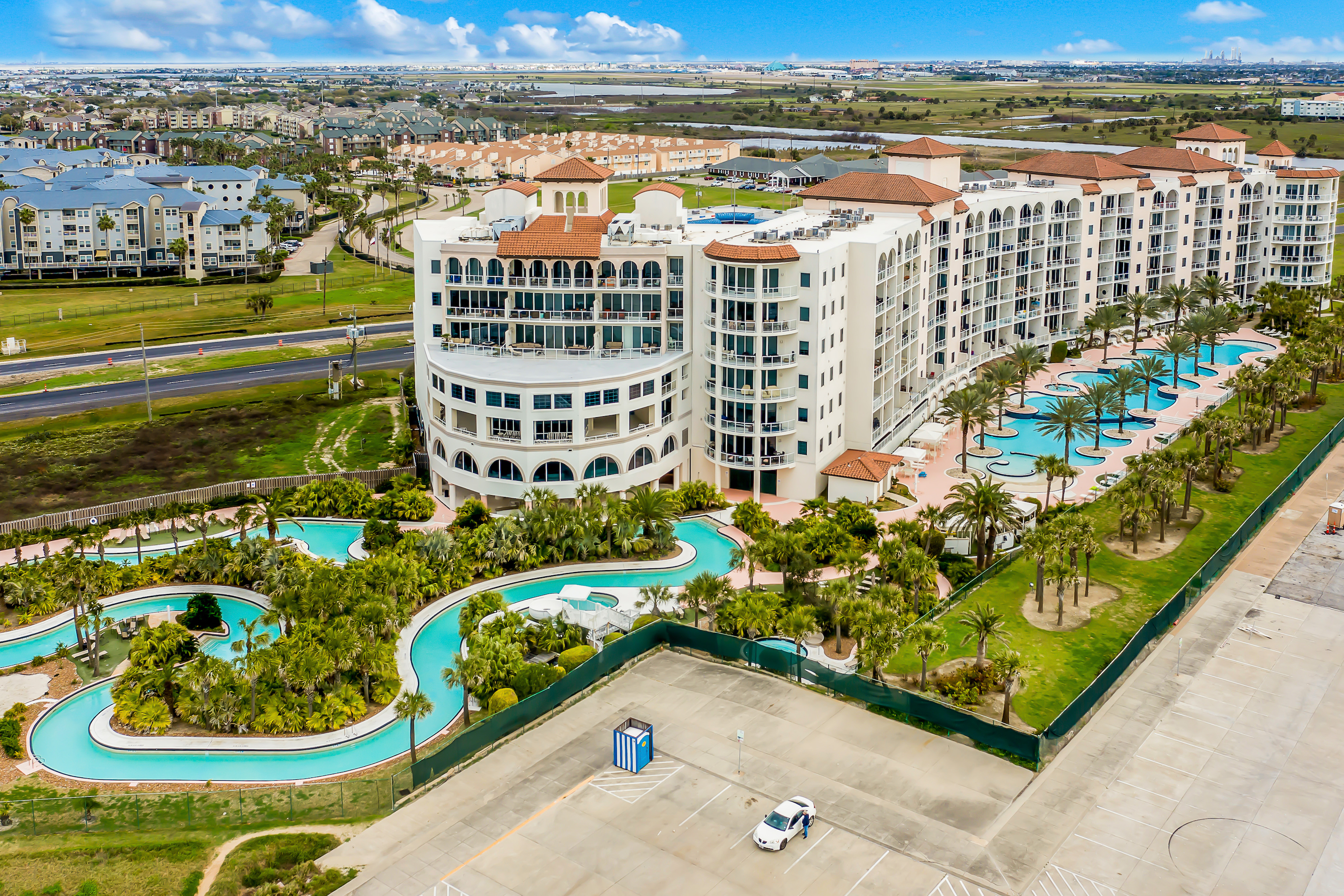 Aerial view of Diamond Beach Resort features lazy river and resort pools