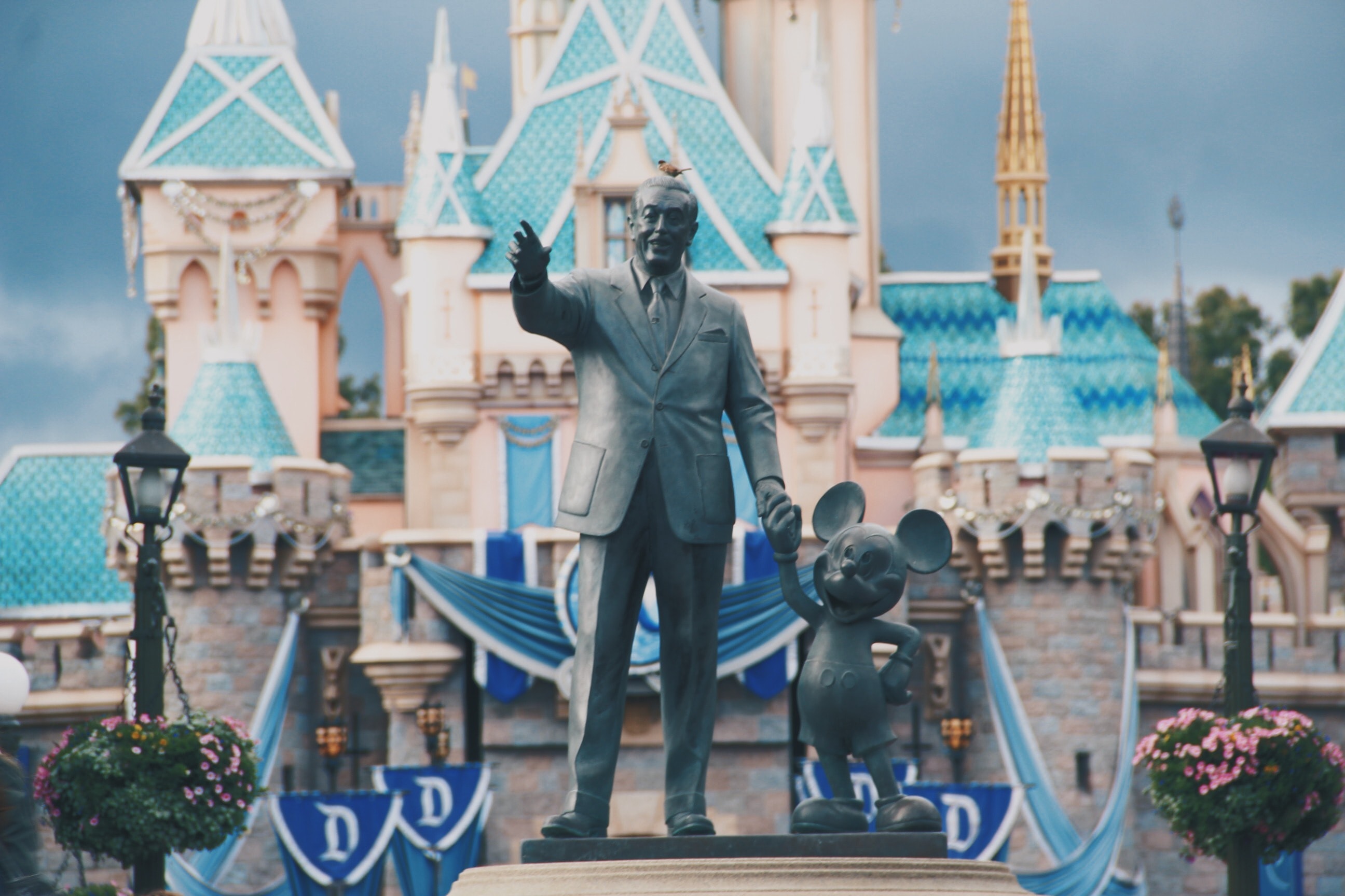 Statue of Walt Disney and Mickey Mouse.