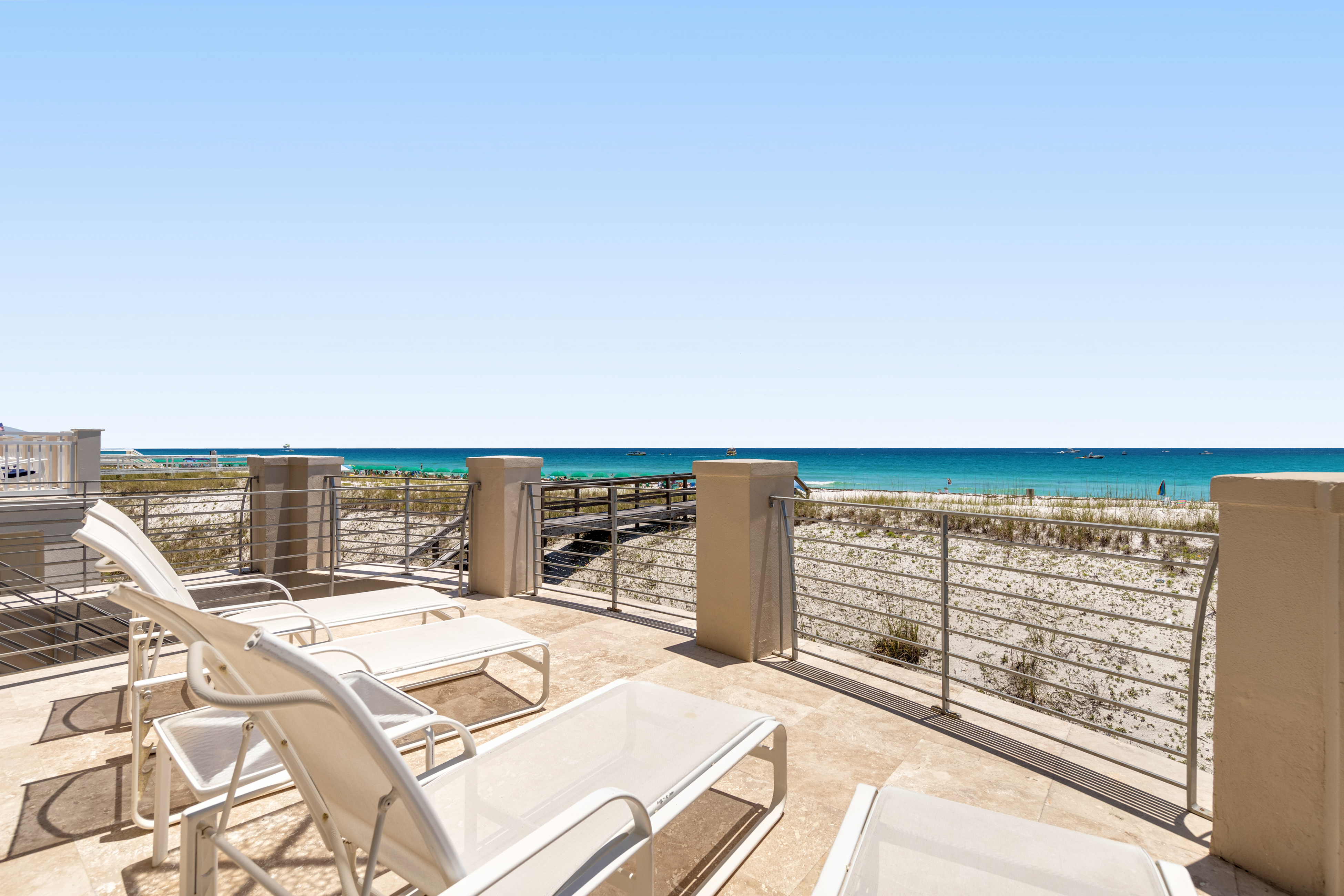 The deck of a vacation rental overlooking the beach in Miramar, Florida.