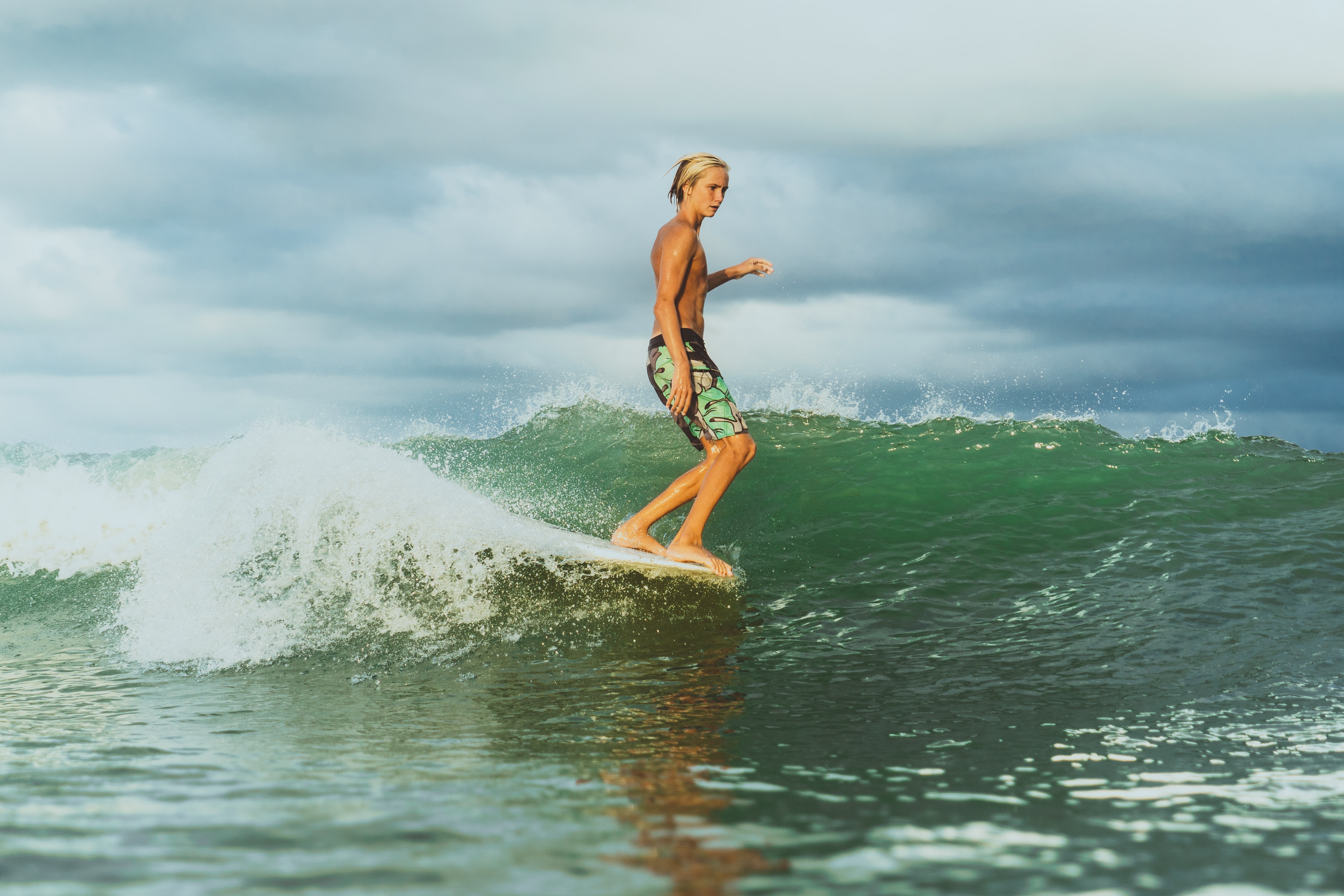 Surfer in Florida riding a wave