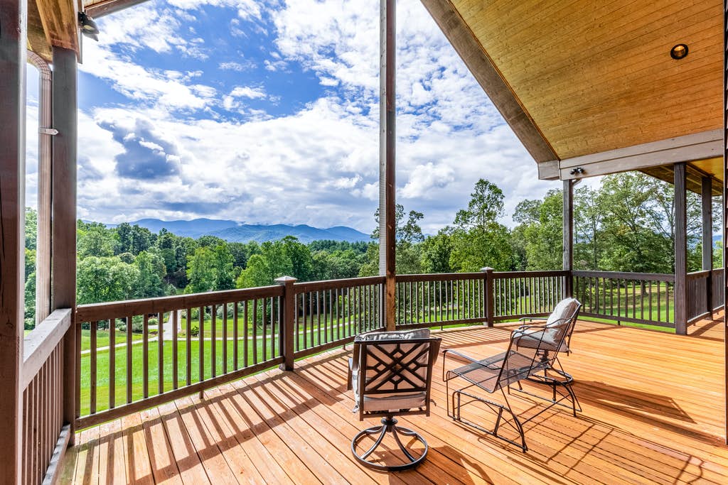 Open concept outdoor deck with a beautiful mountain view