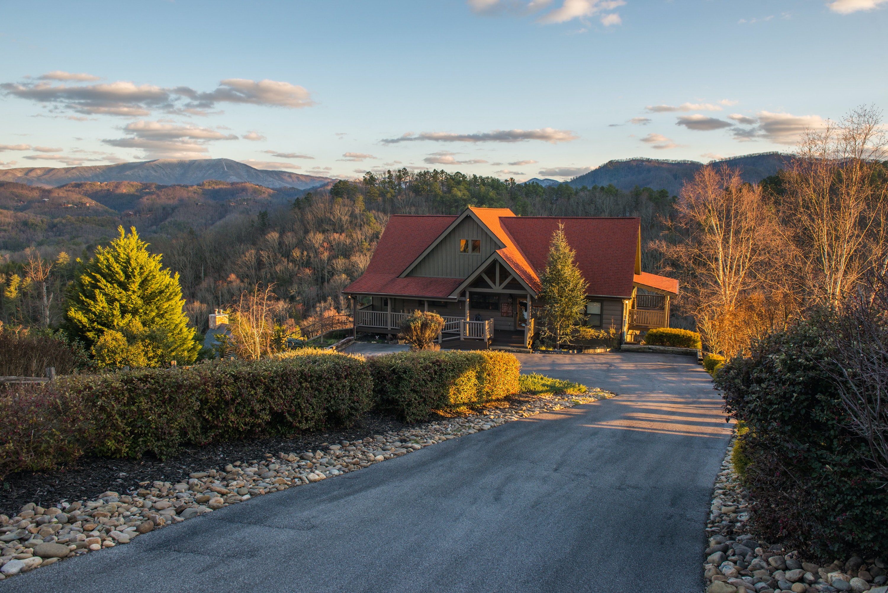 cabin surrounded by fall foliage