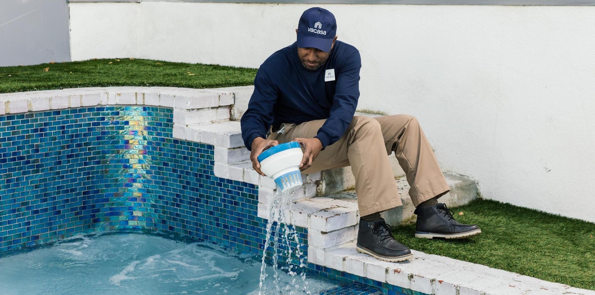 Man cleaning a hot tub.