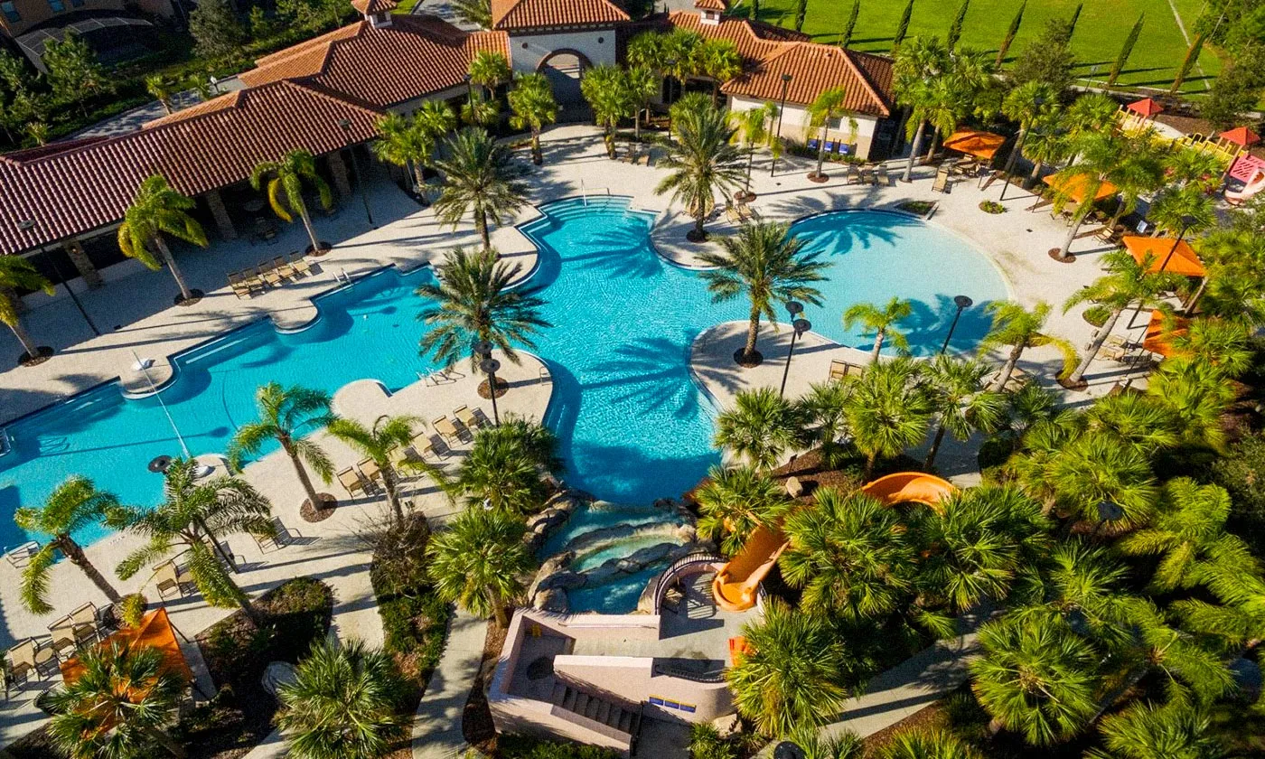 solterra resort pool with slides and palm trees