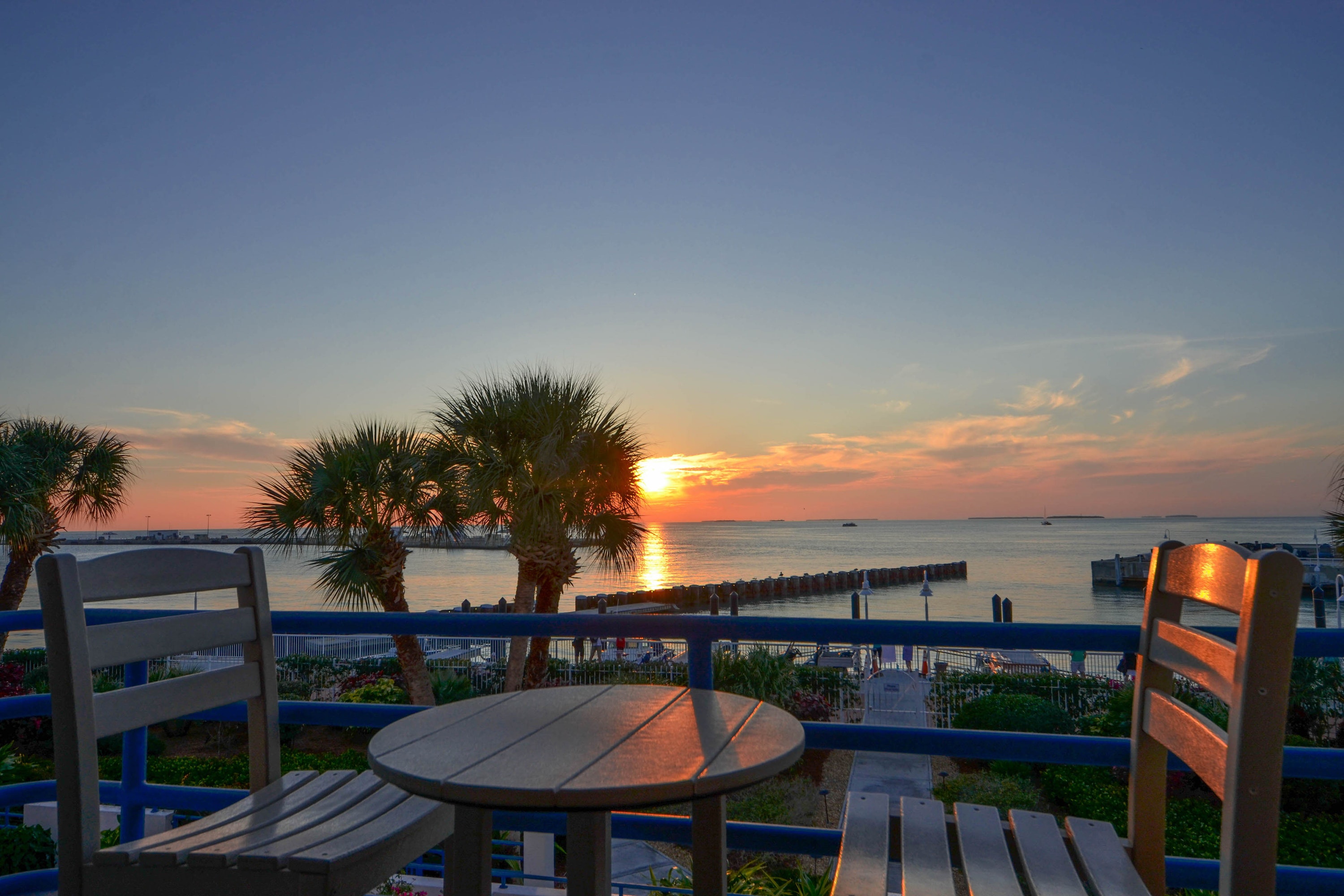 View of sunset over the water from Key West, FL vacation rental balcony