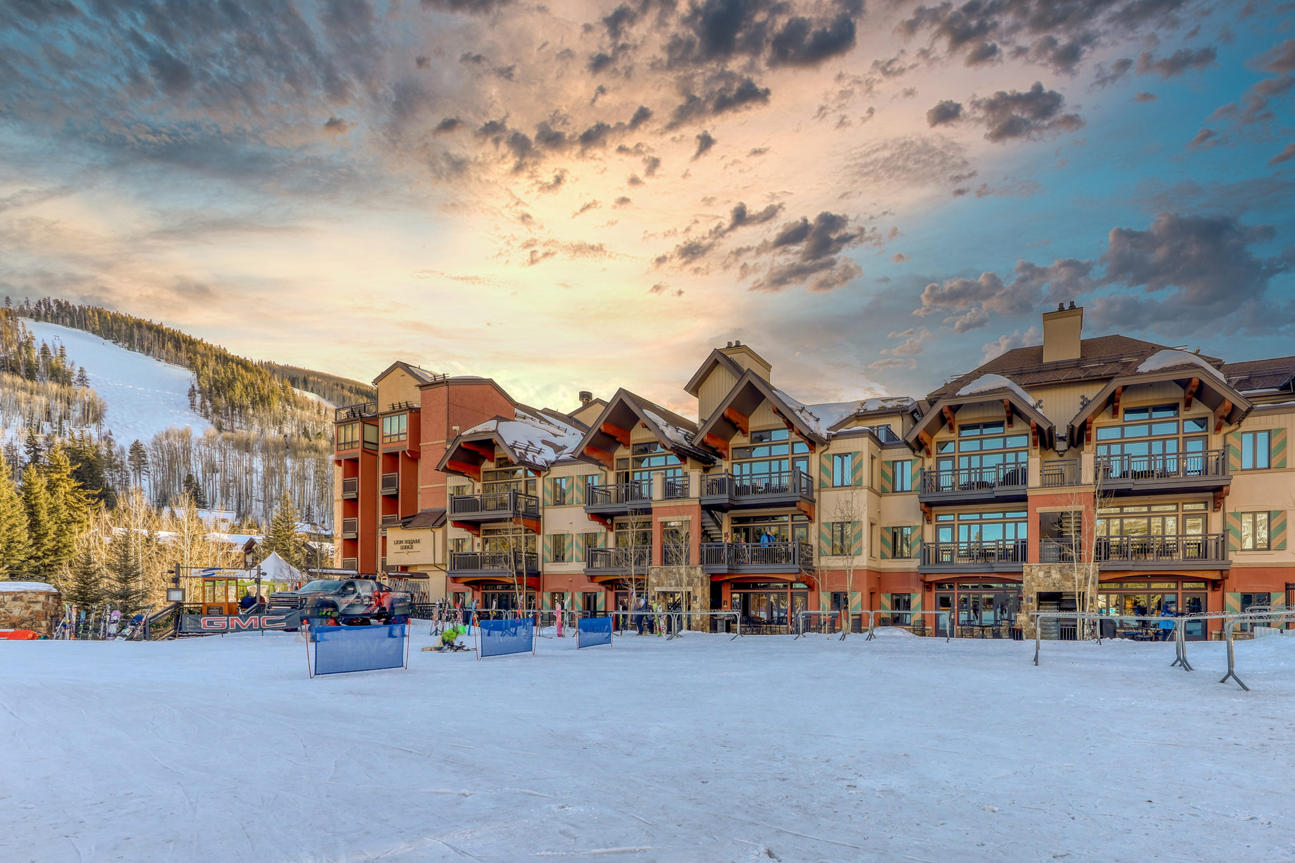 Sunset over a snowy Lion Square Lodge in Vail