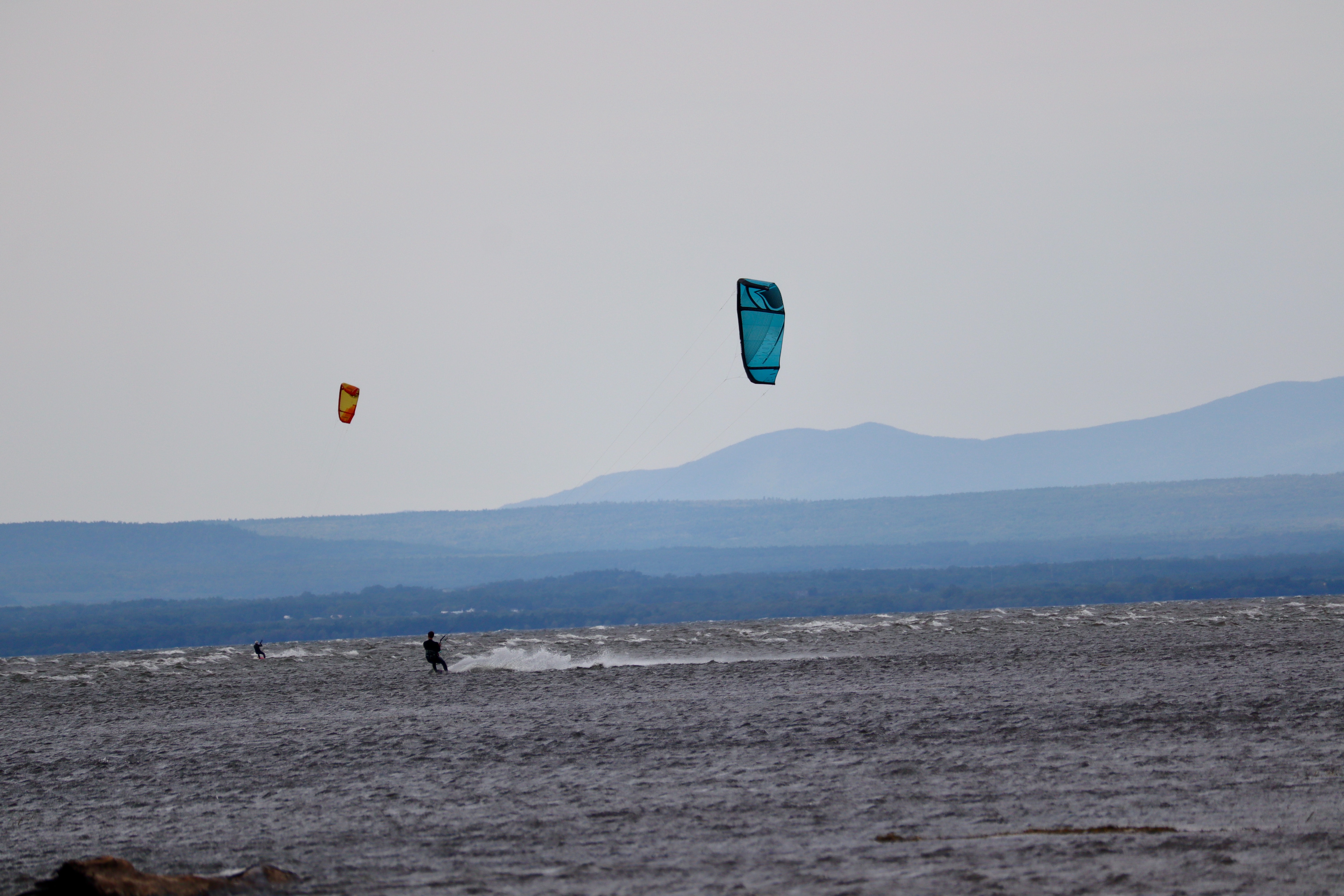 People kite surfing on Lake Champlain