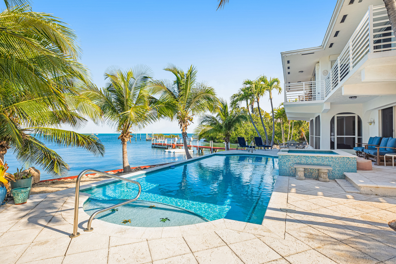 A vacation rental in Marathon, Florida on the beach with a pool.